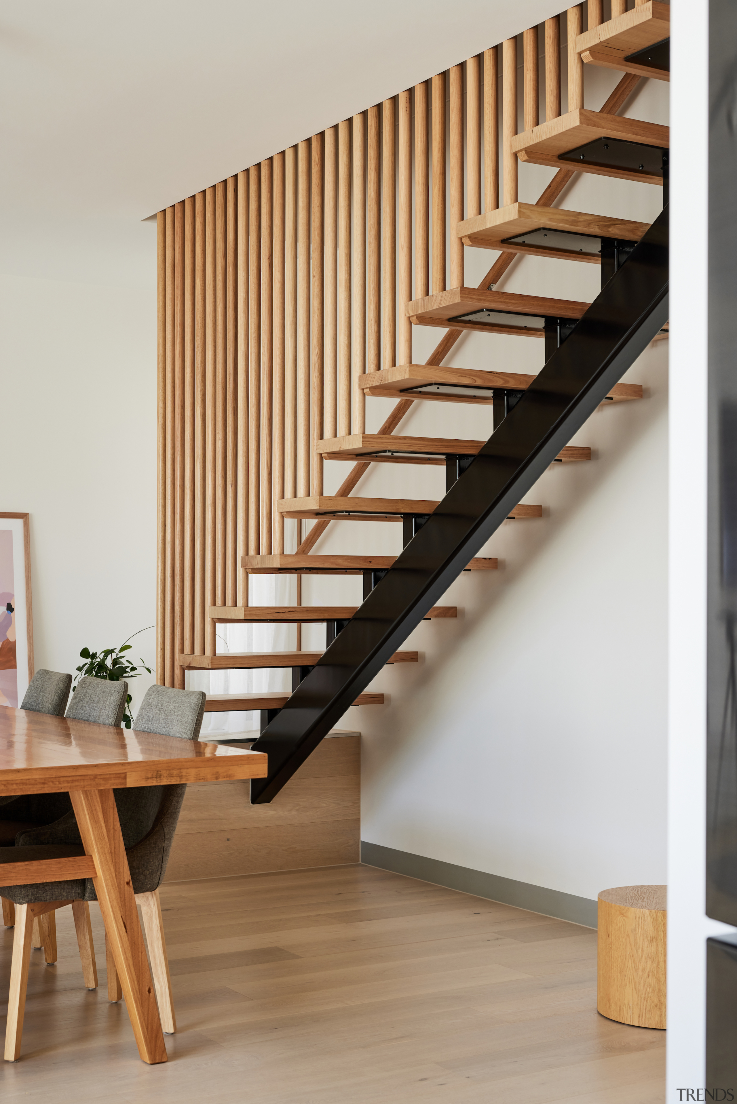 Riserless stairs lead up to bedrooms in the 