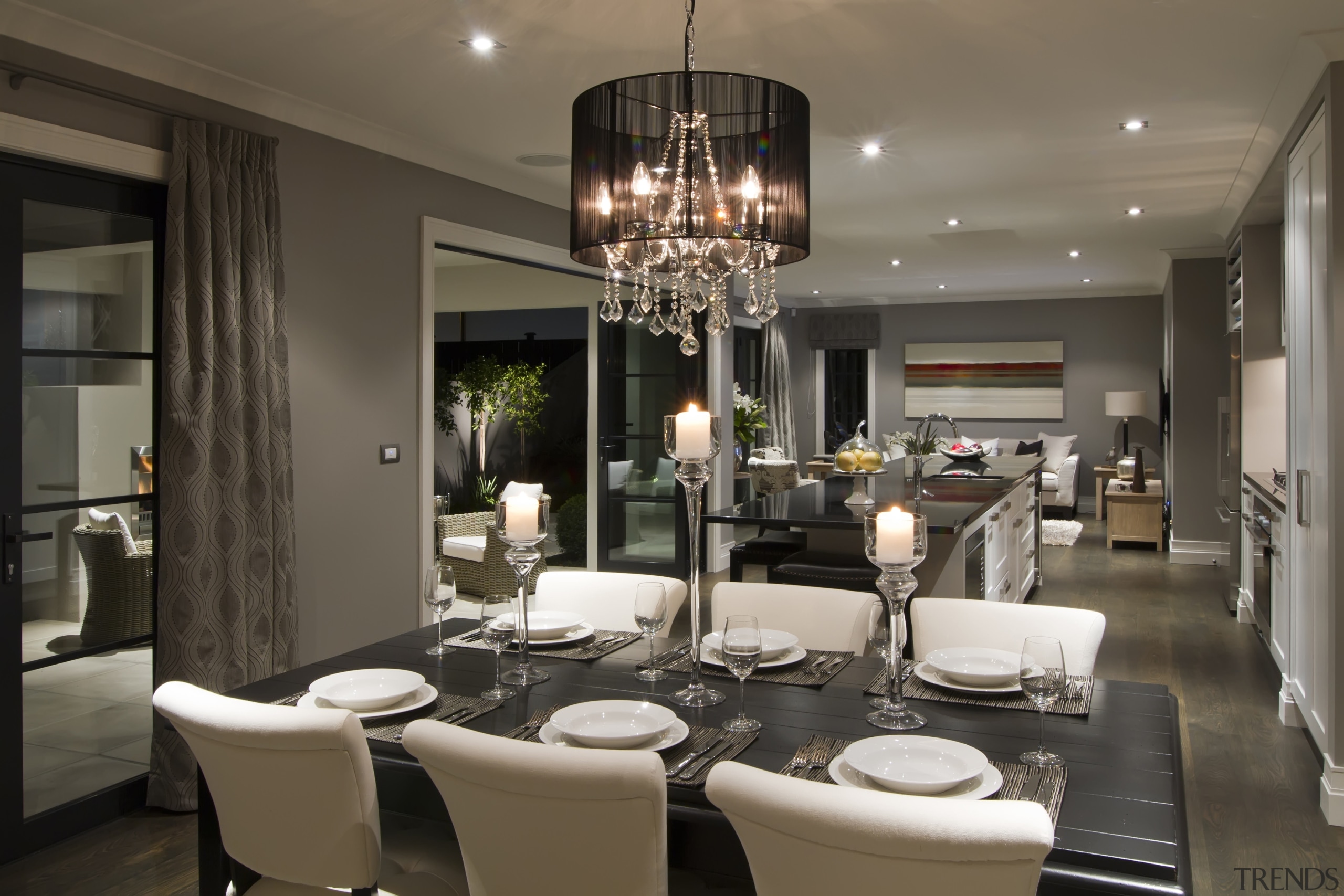 Dining table with white chairs and chandelier light ceiling, dining room, interior design, living room, room, black, brown, gray