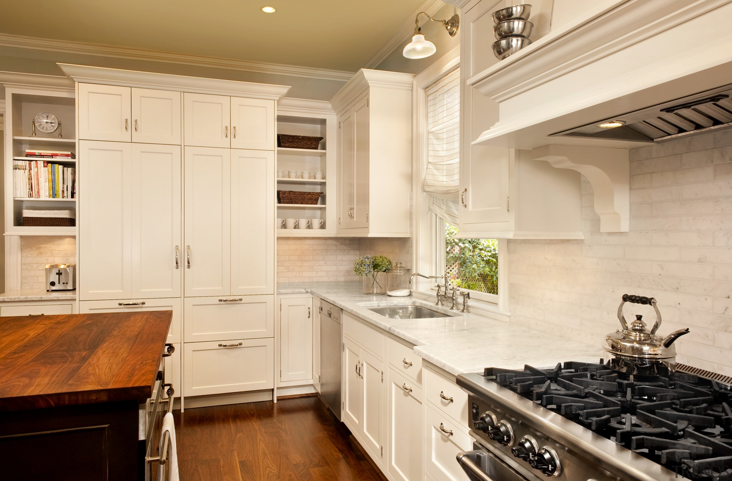 View of kitchen designed by Nadia Subaran. Designed cabinetry, countertop, cuisine classique, home, interior design, kitchen, property, real estate, room, orange