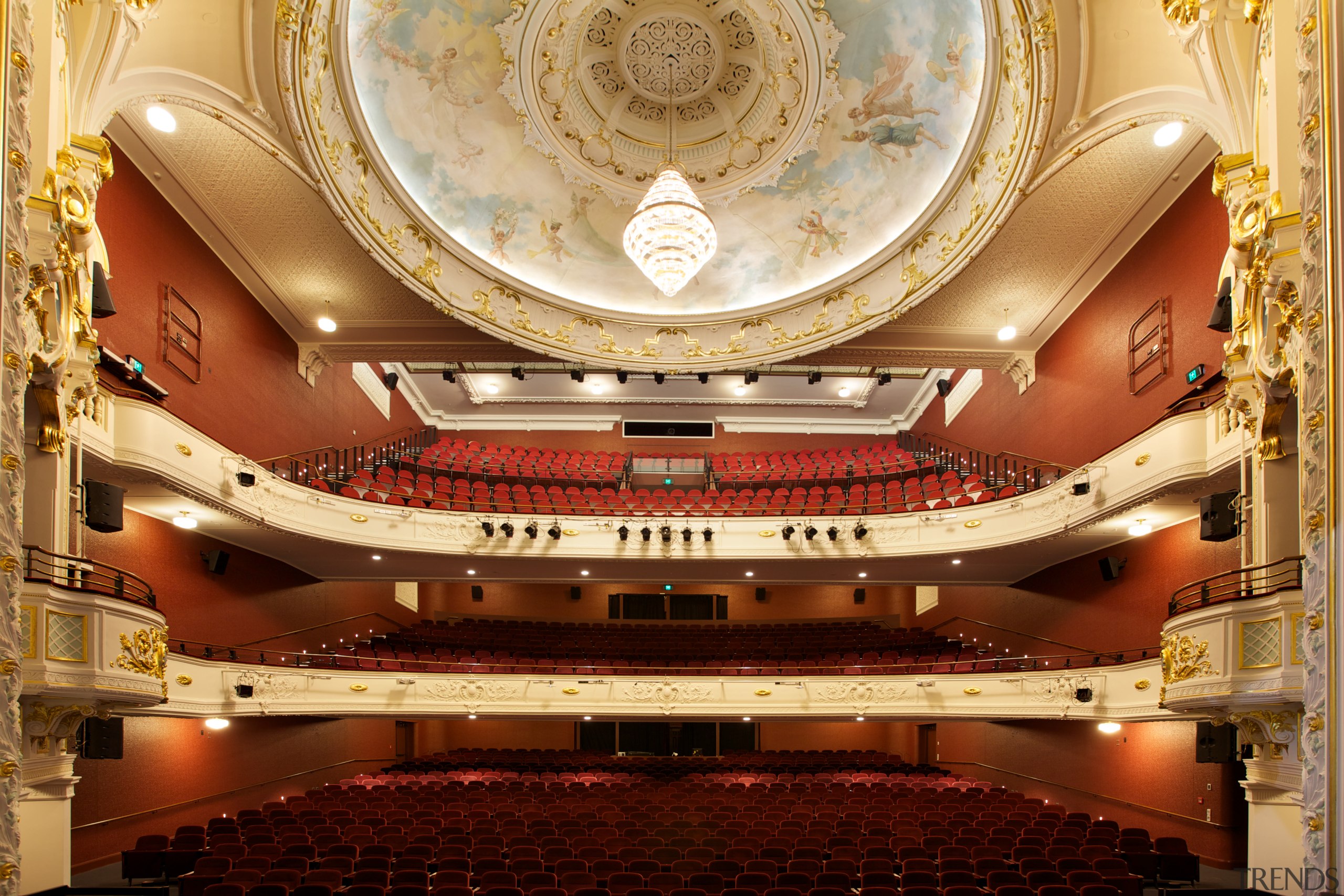 In the Isaac Theatre Royal restoration in Christchurch auditorium, concert hall, musical instrument accessory, opera house, performing arts center, theatre, orange, brown