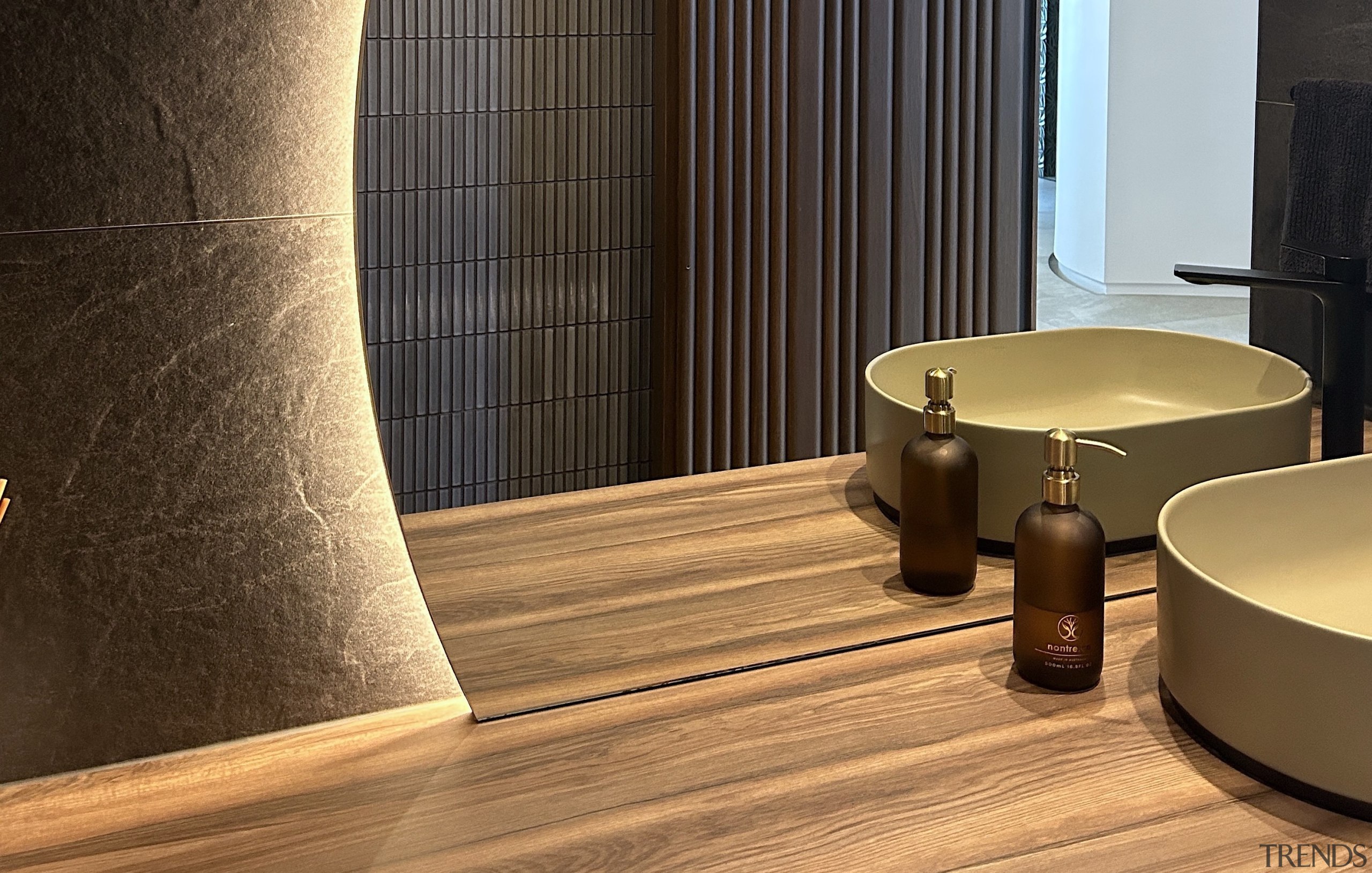 Tile texture is also accentuated via concealed lighting, 