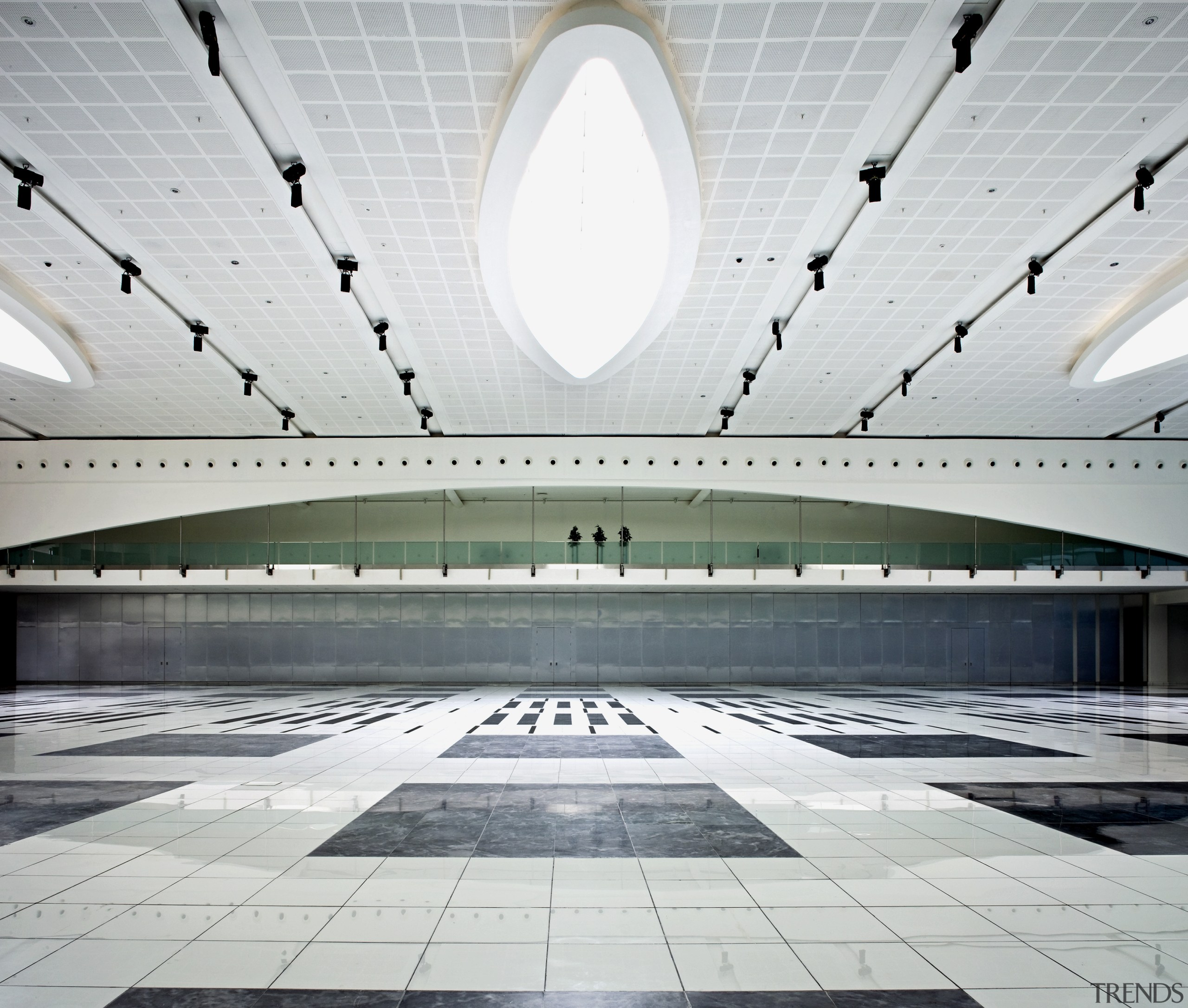 With its dramatic marble and stone floor and architecture, daylighting, line, structure, symmetry, gray, white