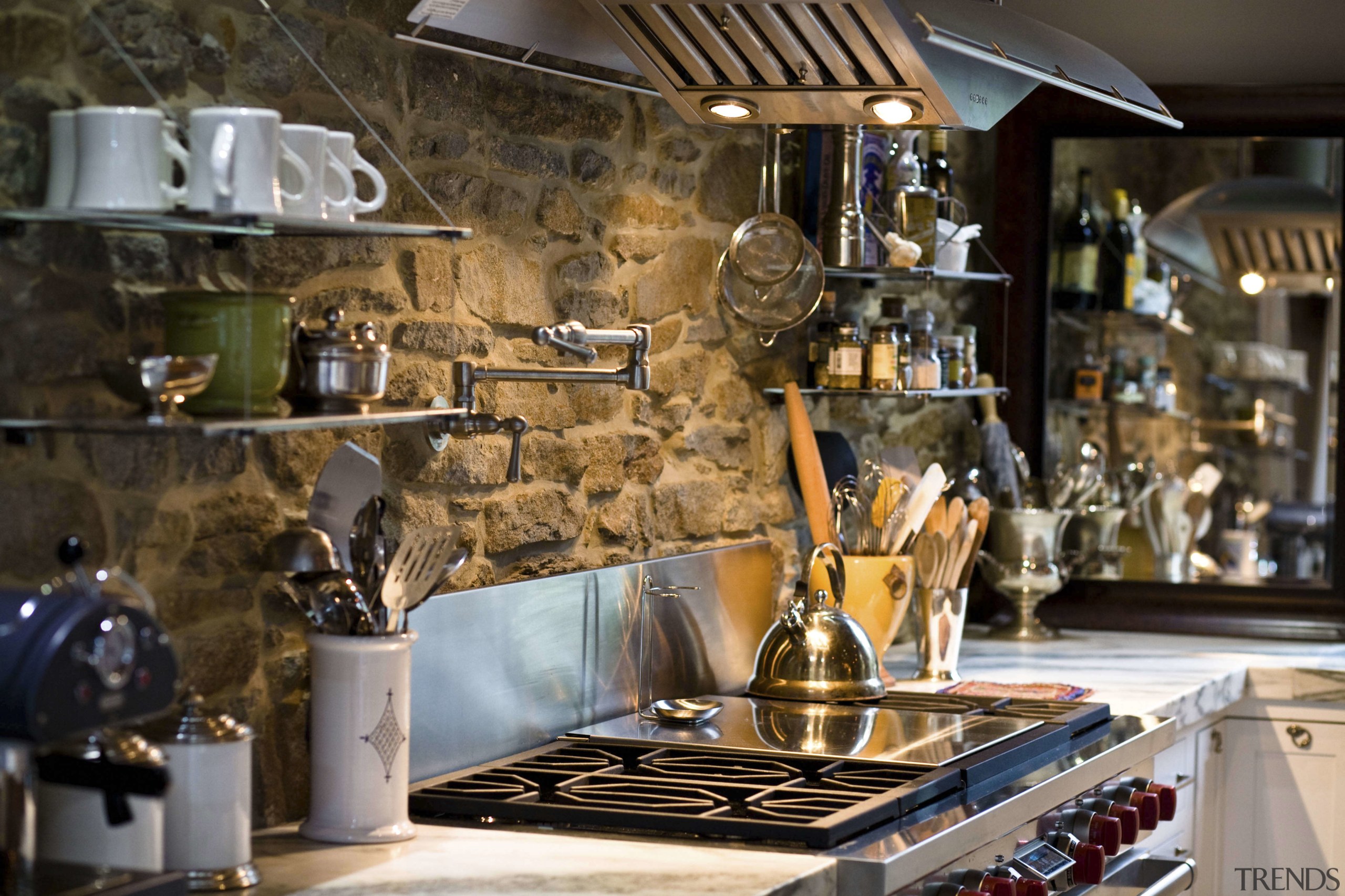 Seen here is a kitchen designed by Jill interior design, brown