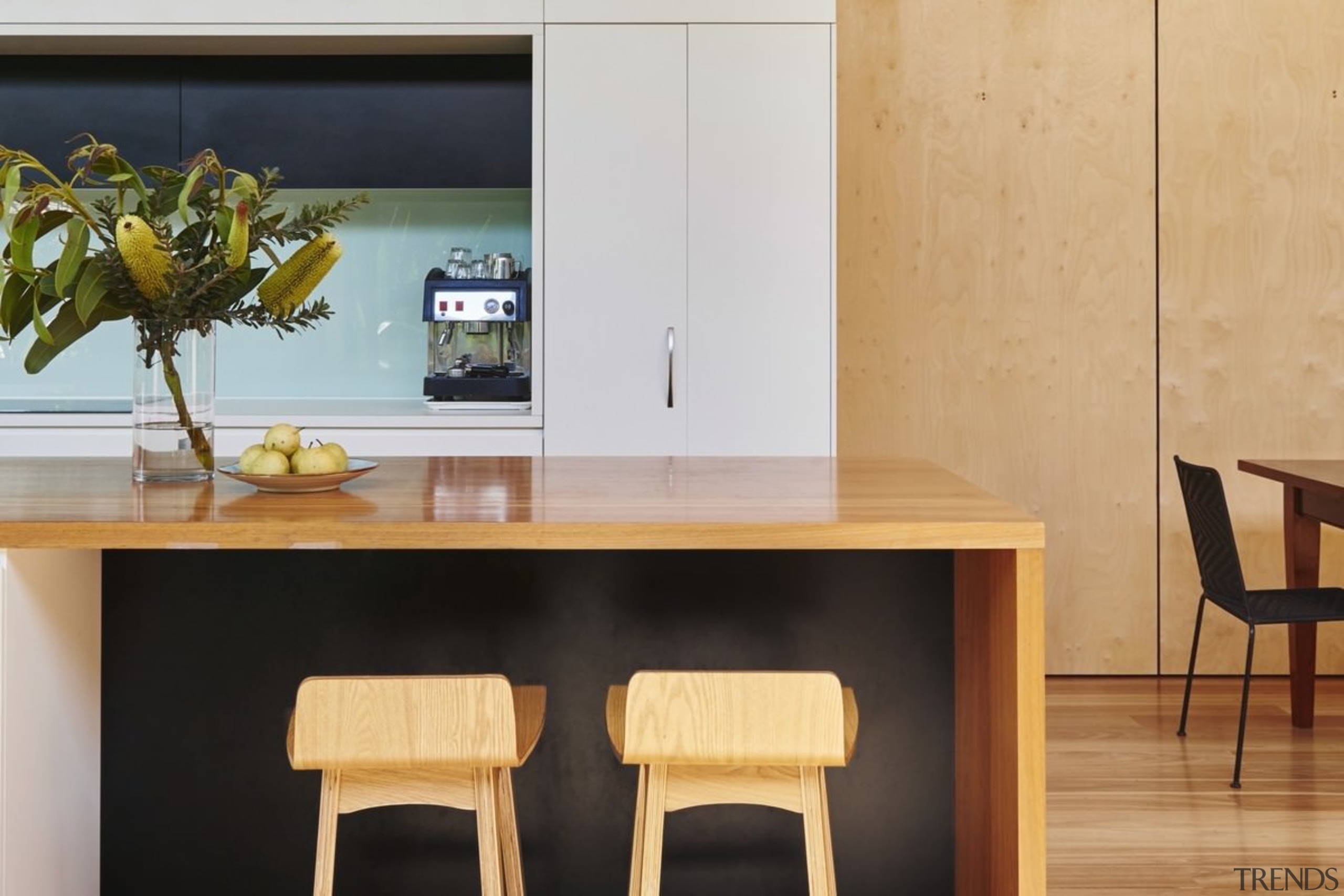 Altereco Design utilised wood throughout the renovation – chair, furniture, interior design, product design, table, orange, black