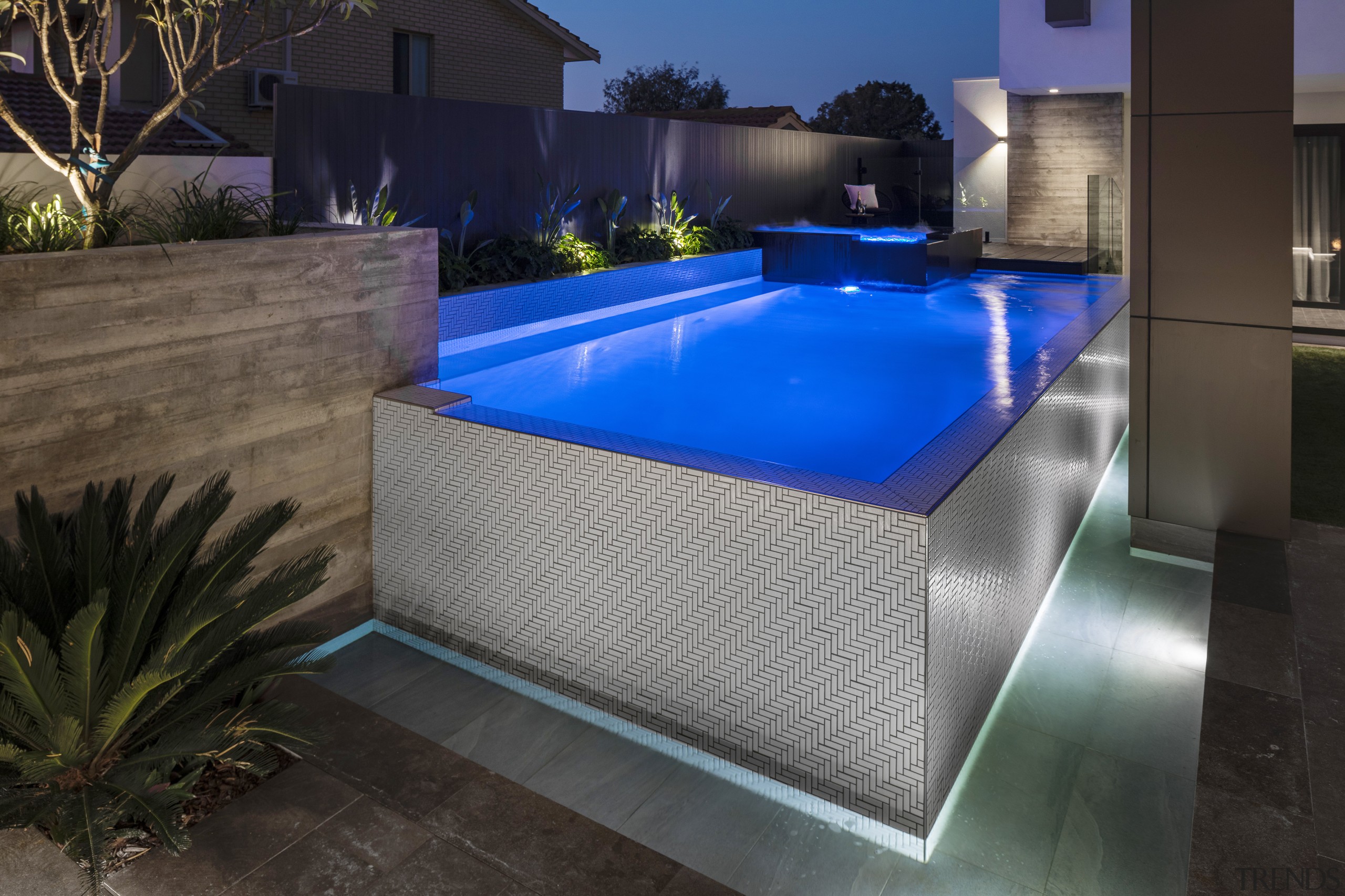 Wow! Thanks to adroit lighting, the pool takes 