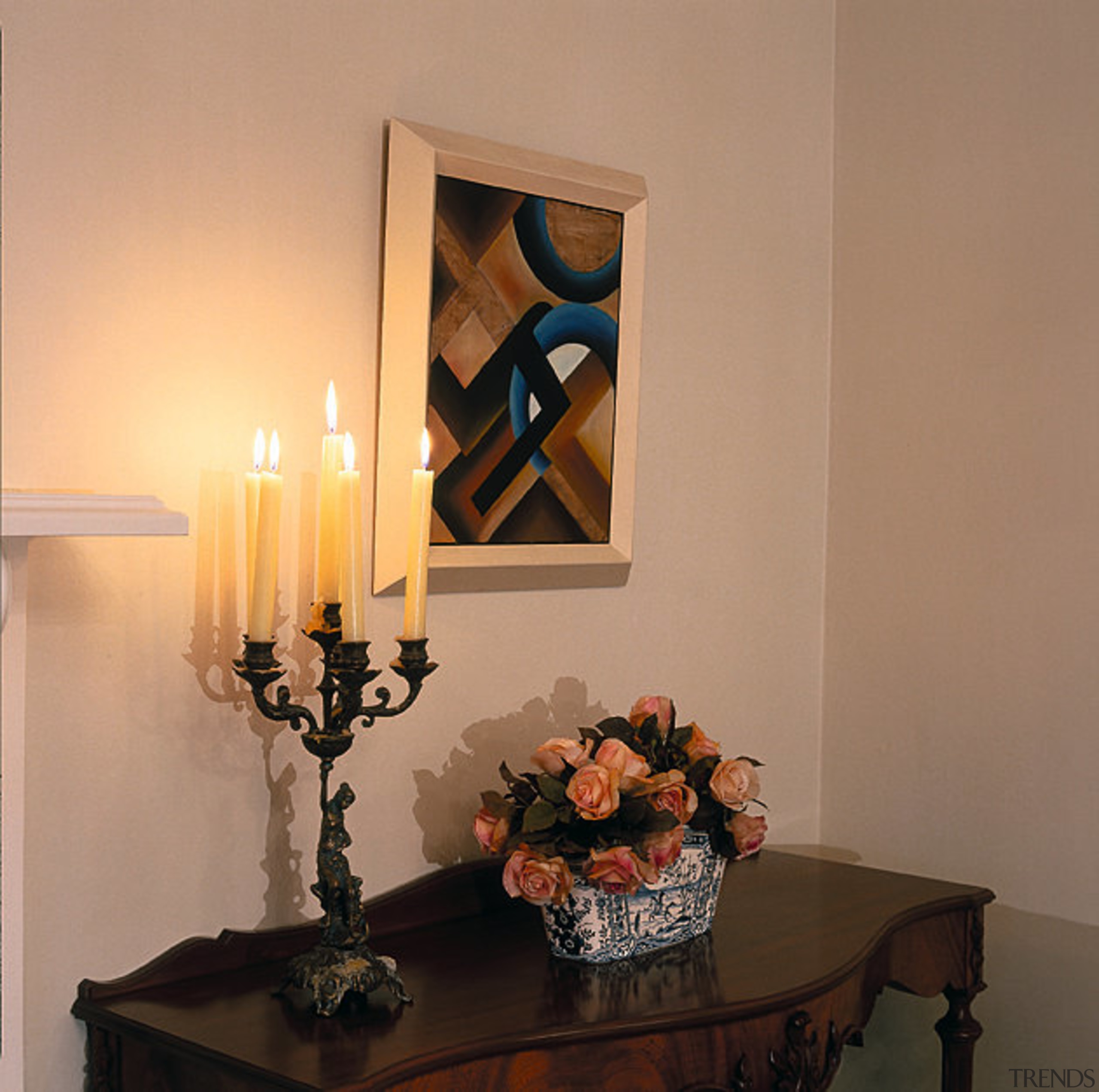 A view of table with a candelabra - chandelier, decor, furniture, home, interior design, lamp, lampshade, light fixture, lighting, lighting accessory, living room, room, still life, table, orange, brown