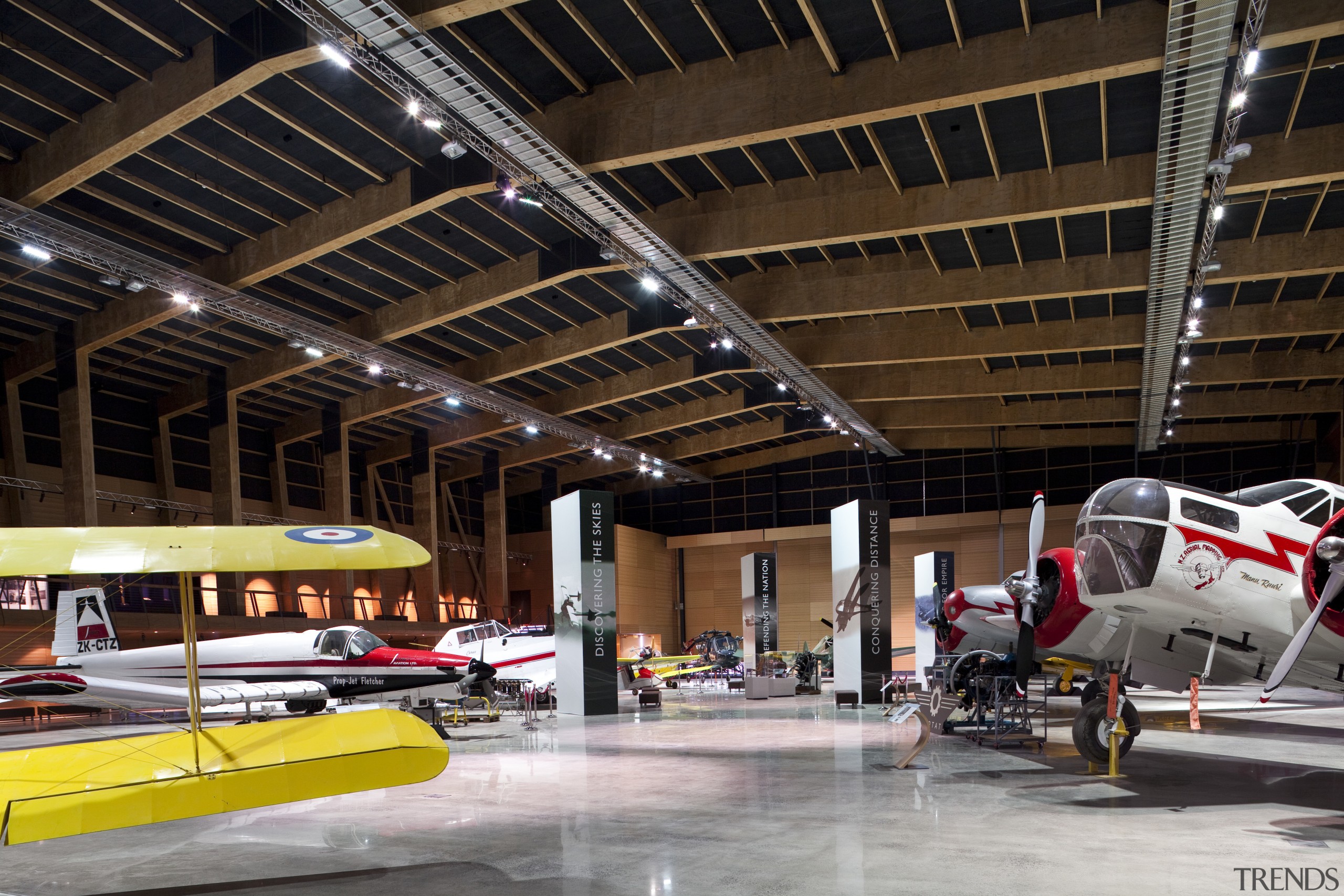 Here is a view of MOTAT's Arviation Display aerospace engineering, automotive design, aviation, car, hangar, brown