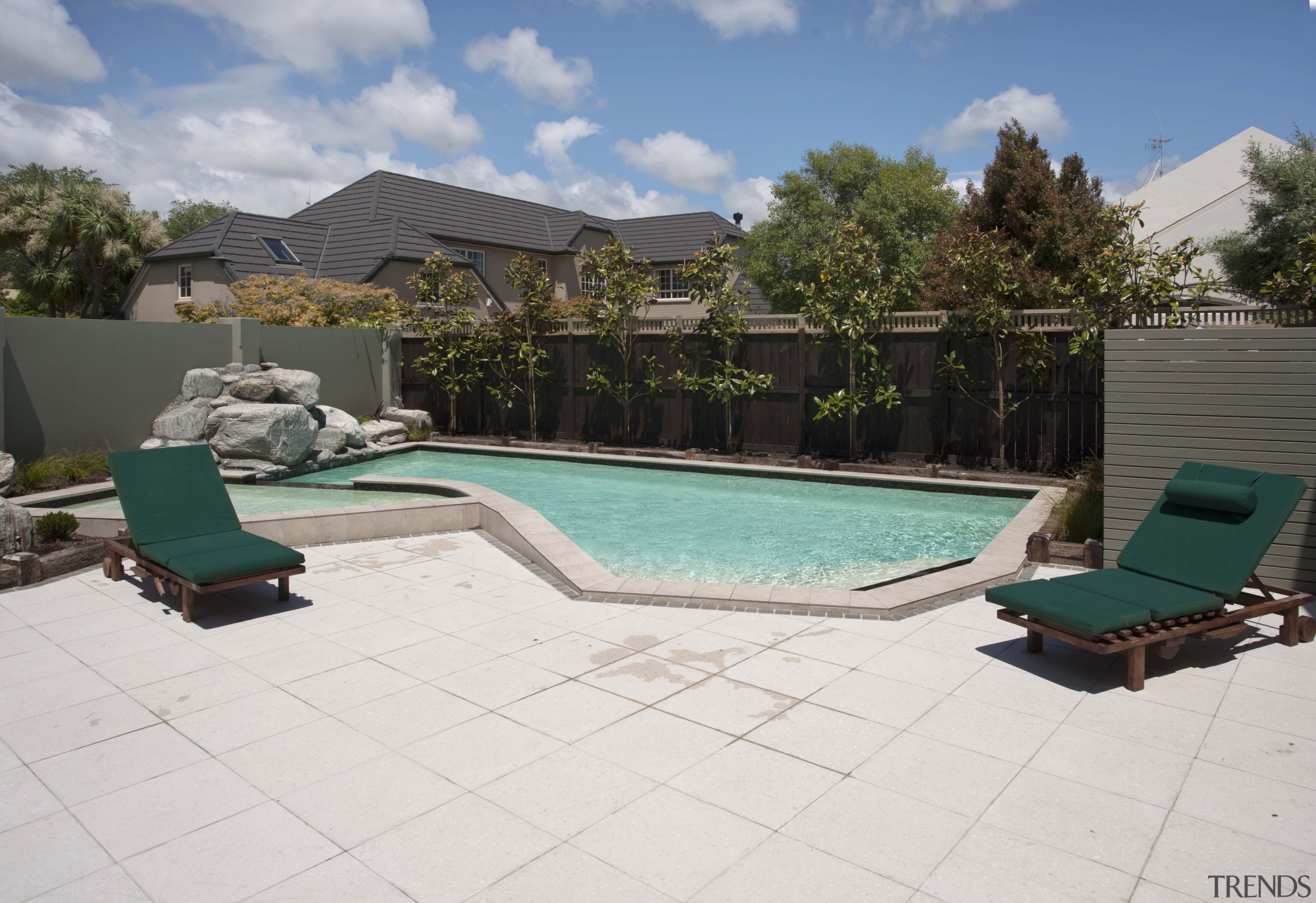 View of contemporary house with pool. - View area, backyard, estate, home, house, leisure, outdoor furniture, outdoor structure, property, real estate, resort, sunlounger, swimming pool, vacation, villa, yard, white