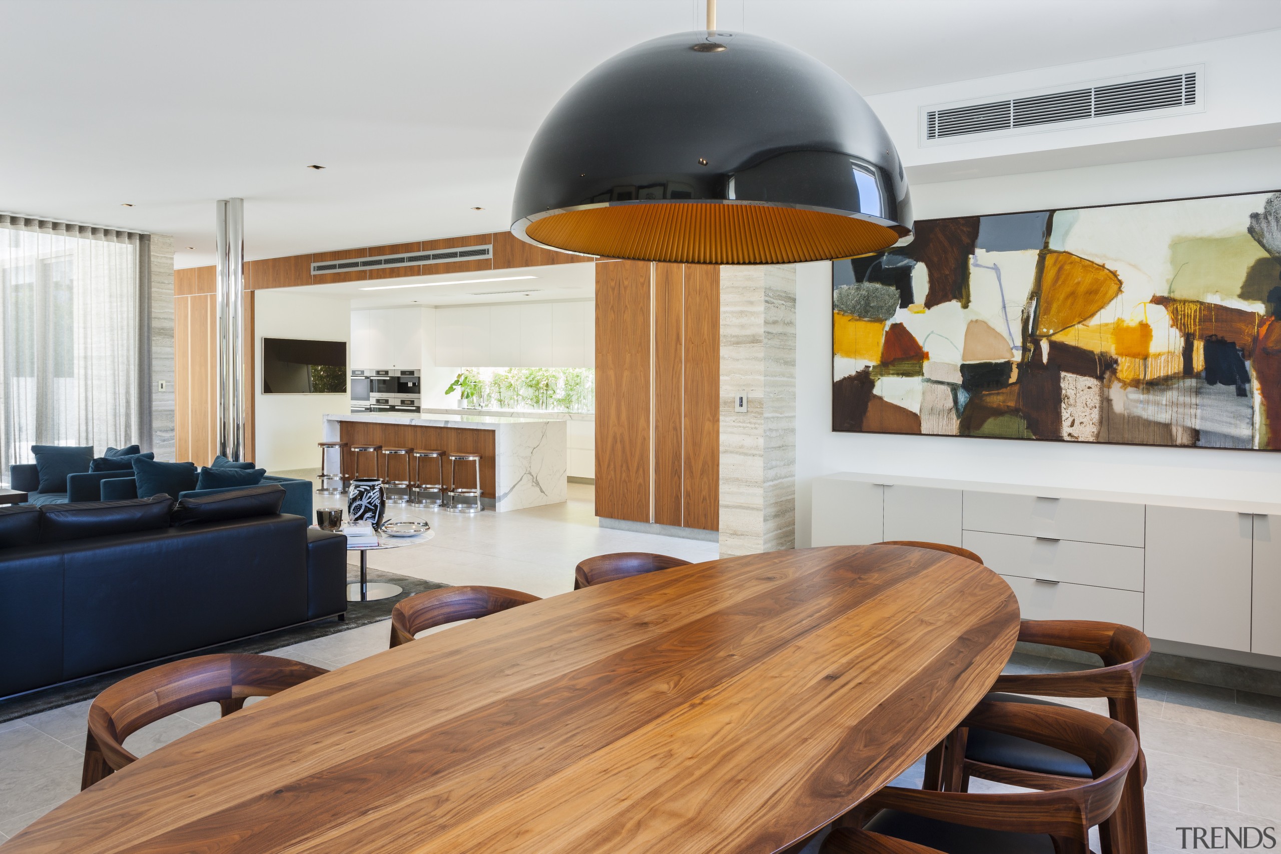 Walnut panelling frames this kitchen within the open-plan interior design, real estate, table, white