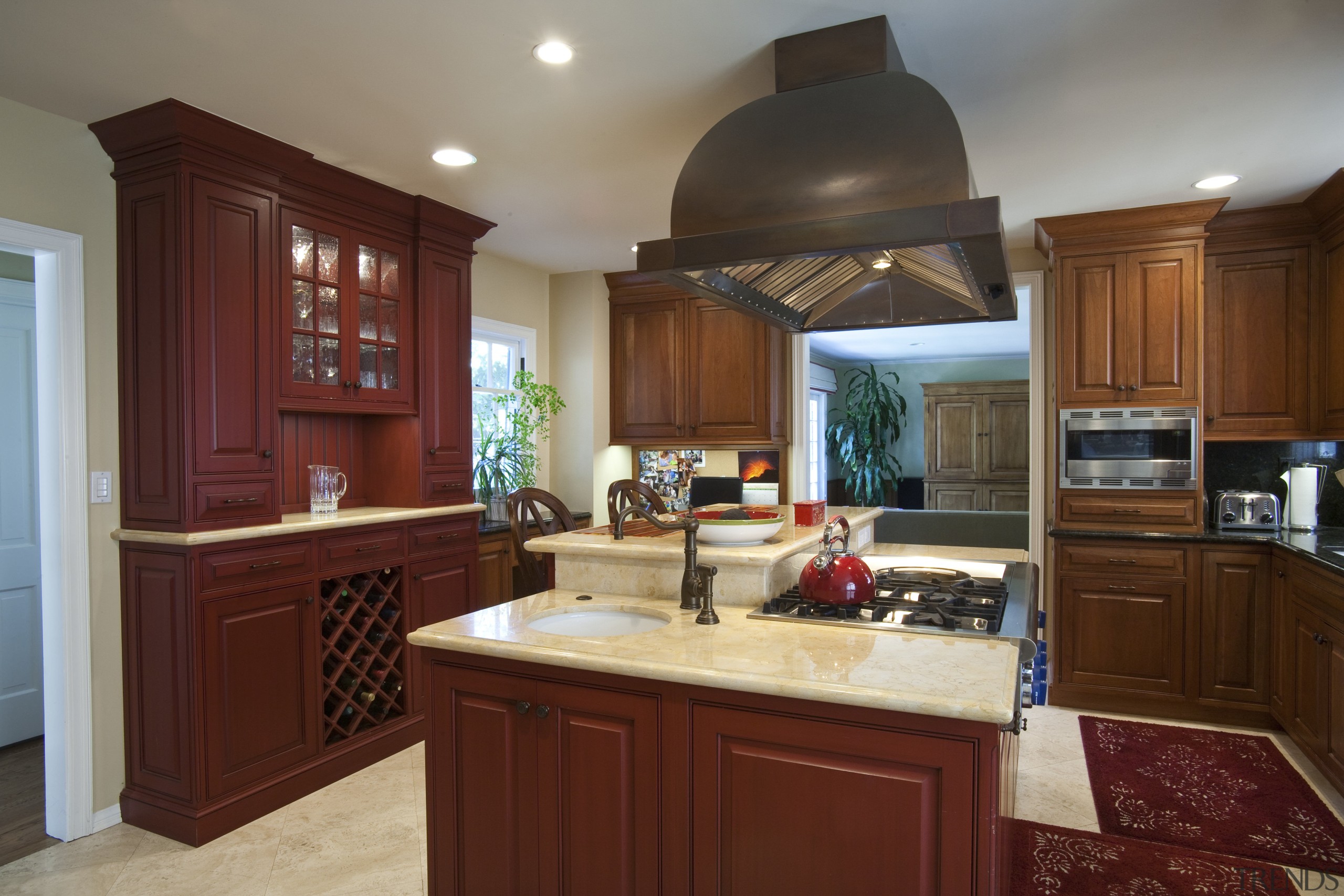 View of a traditional-styled kitchen designed by Pacific cabinetry, countertop, cuisine classique, interior design, kitchen, real estate, room, red, gray