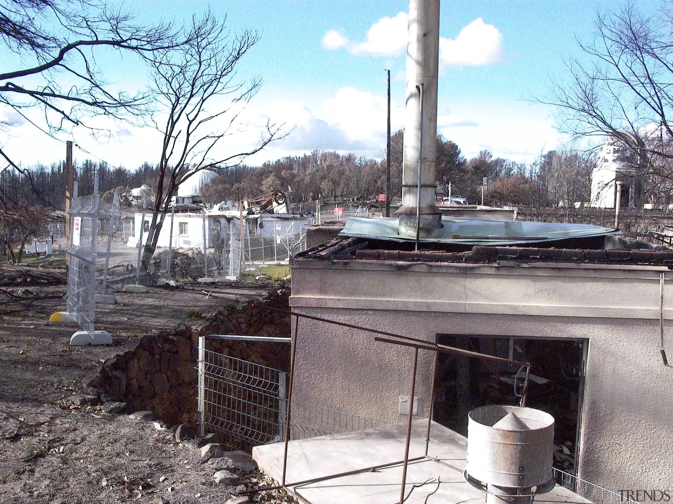 View of the observatory prior to renovations after tree, white, gray