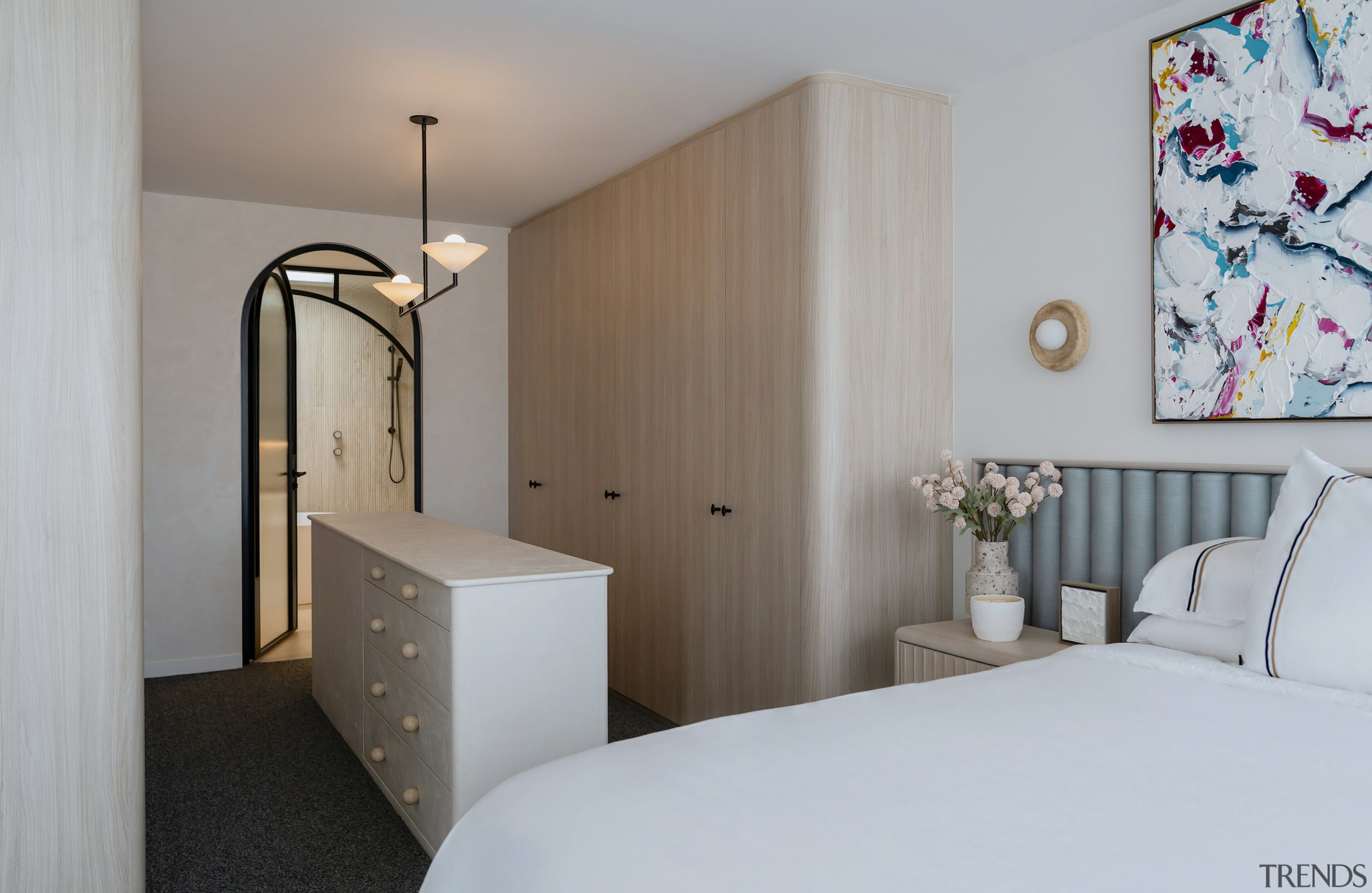 The master bedroom features limed oak cabinets, which 