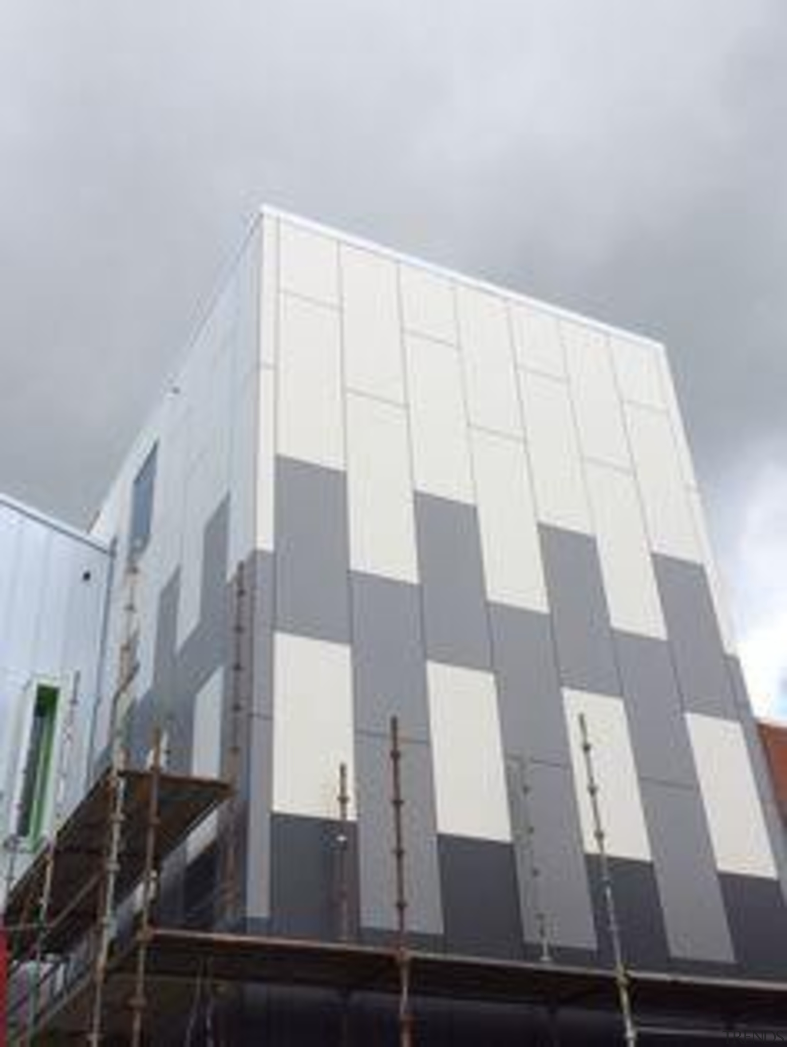 A new radiology clinic in Tauranga, New Zealand, architecture, building, commercial building, condominium, corporate headquarters, daylighting, facade, headquarters, sky, structure, gray