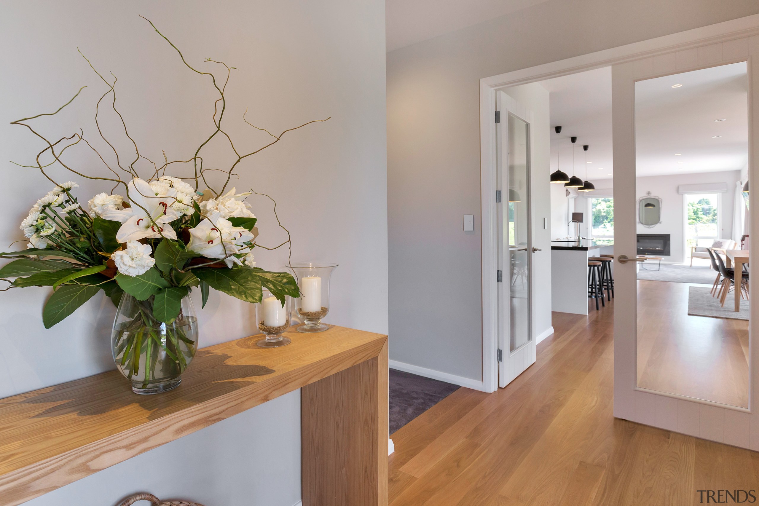 This home achieves a light, airy appeal in floor, flooring, home, interior design, property, real estate, room, gray