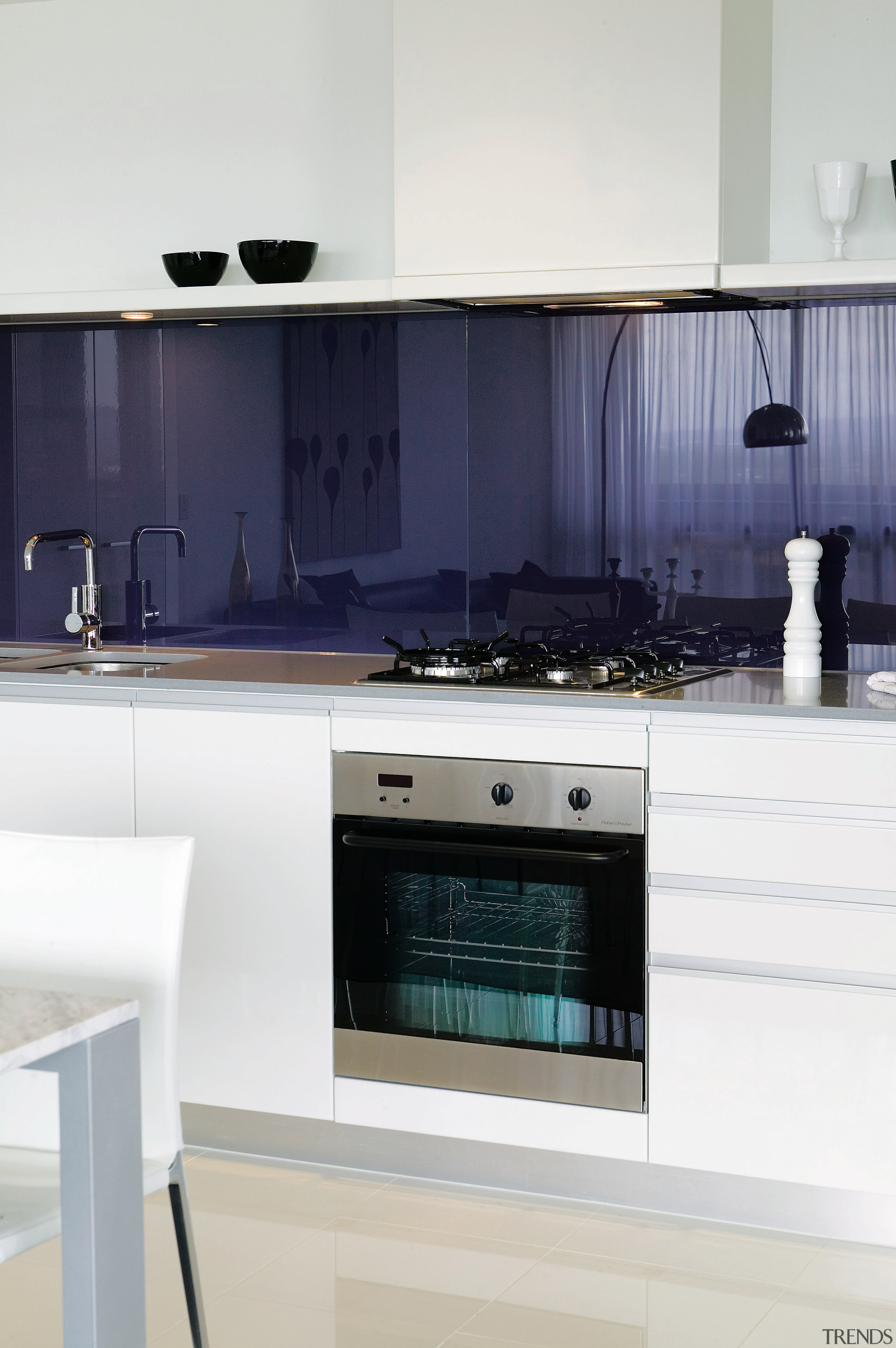 A view of this kitchen featuring the latest cabinetry, countertop, floor, home, home appliance, interior design, kitchen, kitchen stove, room, white