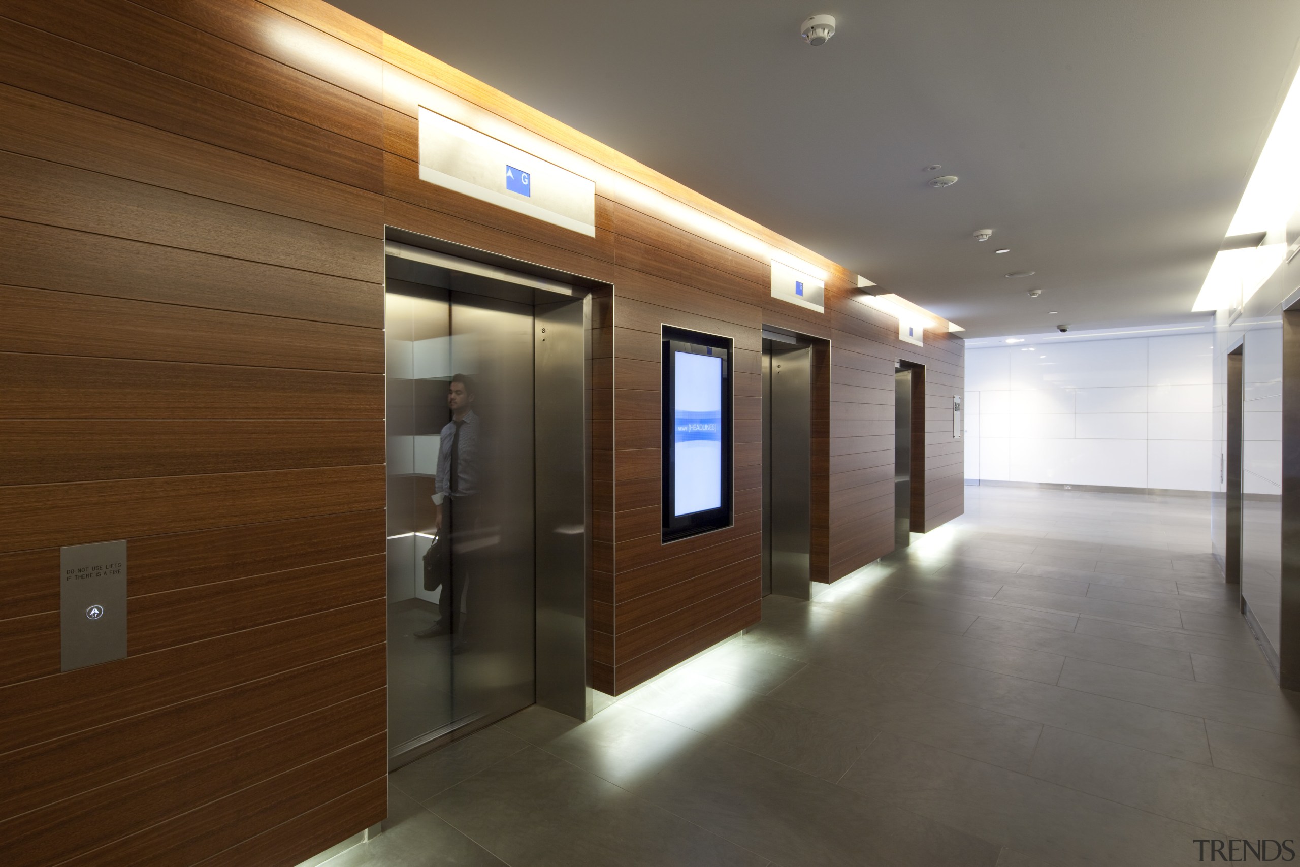 View of high rise office tower with wooden architecture, ceiling, floor, flooring, interior design, lobby, real estate, brown, gray