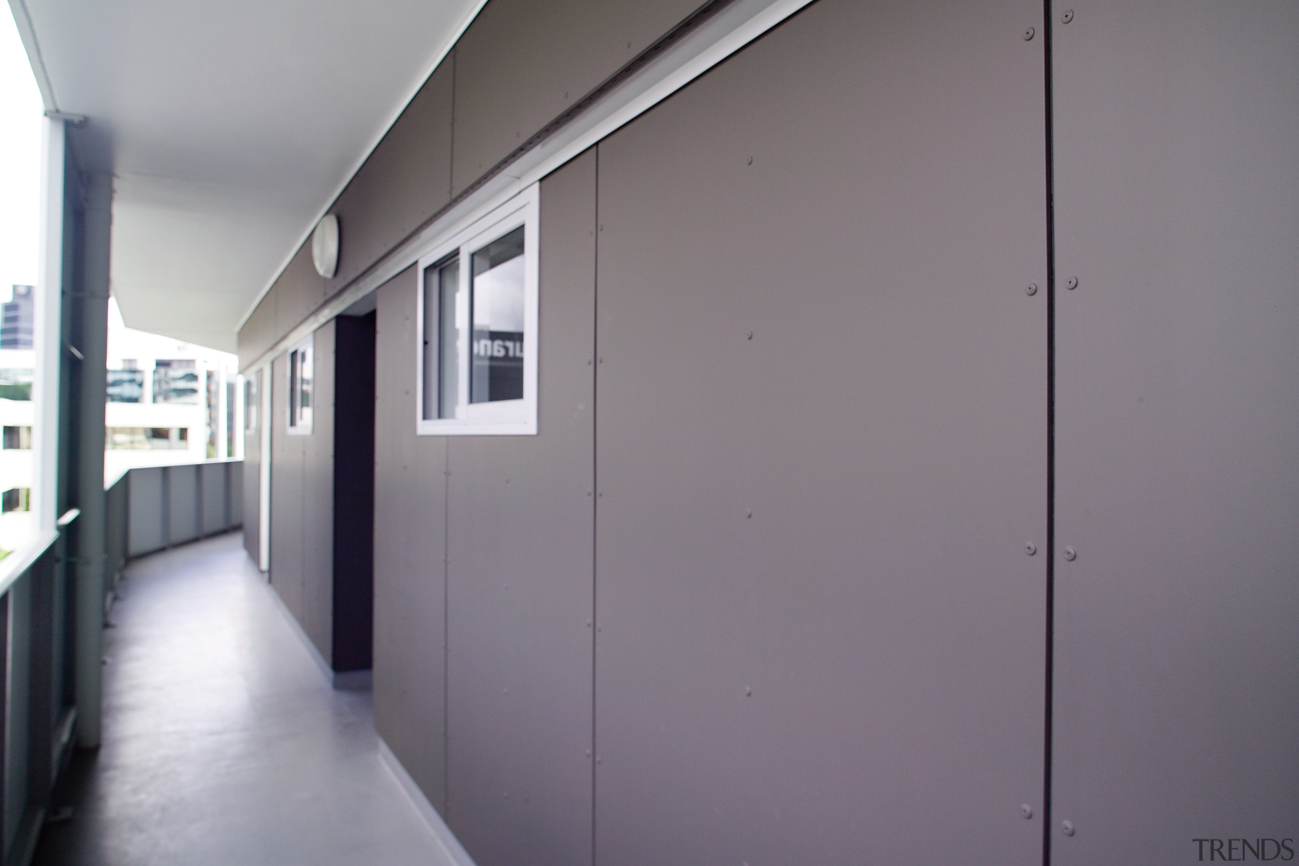 A view of some cladding by PBS Group. architecture, daylighting, door, house, wall, window, gray