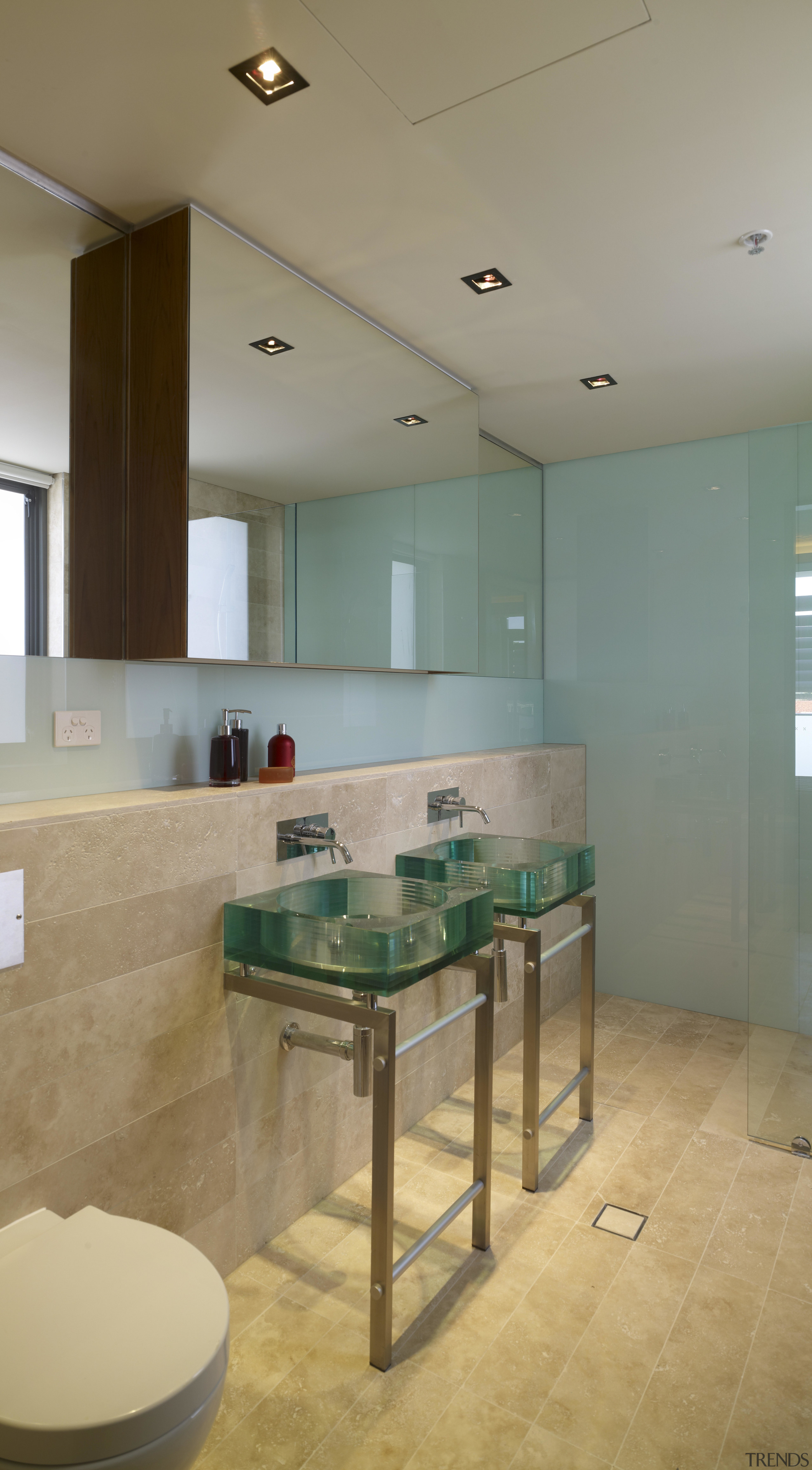 View of penthouse bathroom in restored historic building architecture, bathroom, ceiling, daylighting, floor, flooring, glass, interior design, real estate, room, sink, table, tile, wall, gray, brown