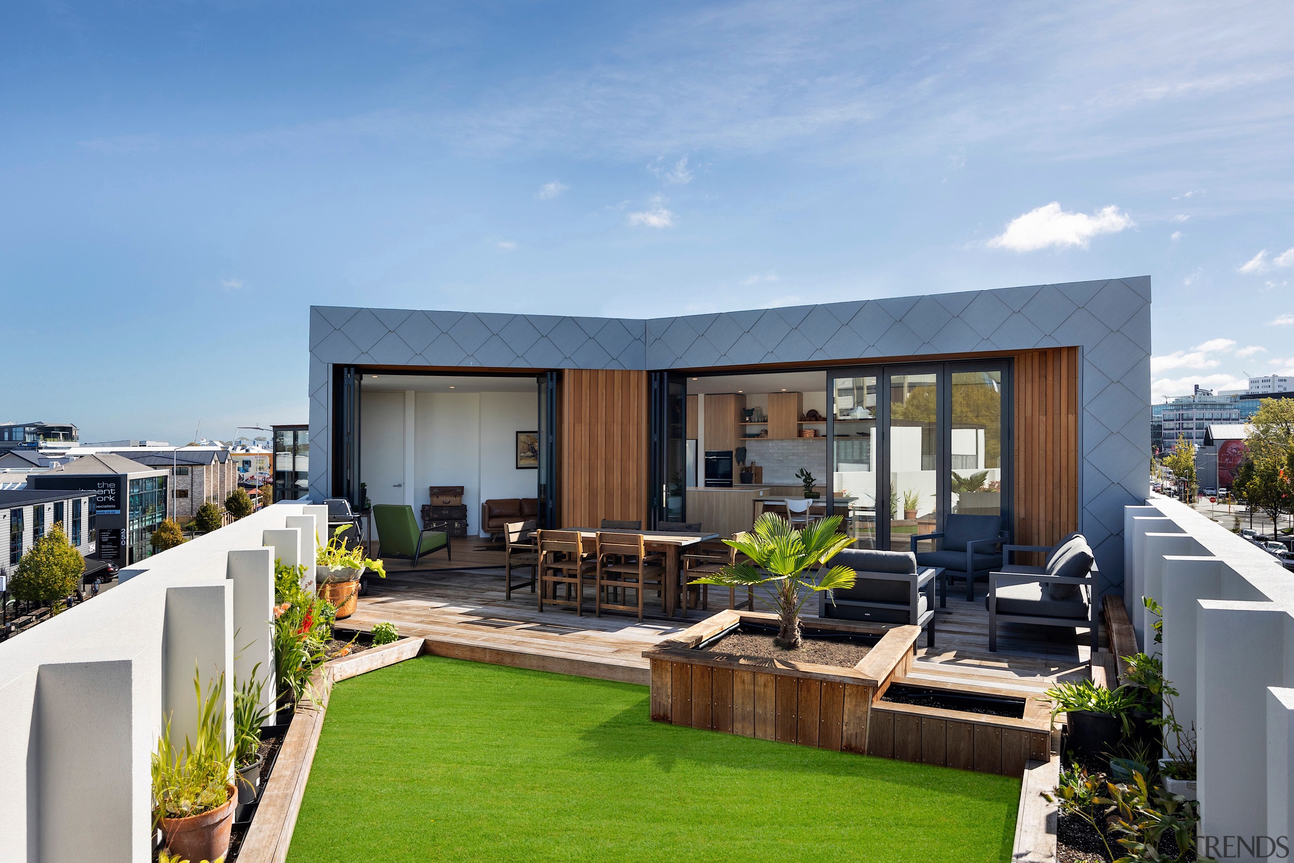 Rooftop penthouse complete with front lawn. 