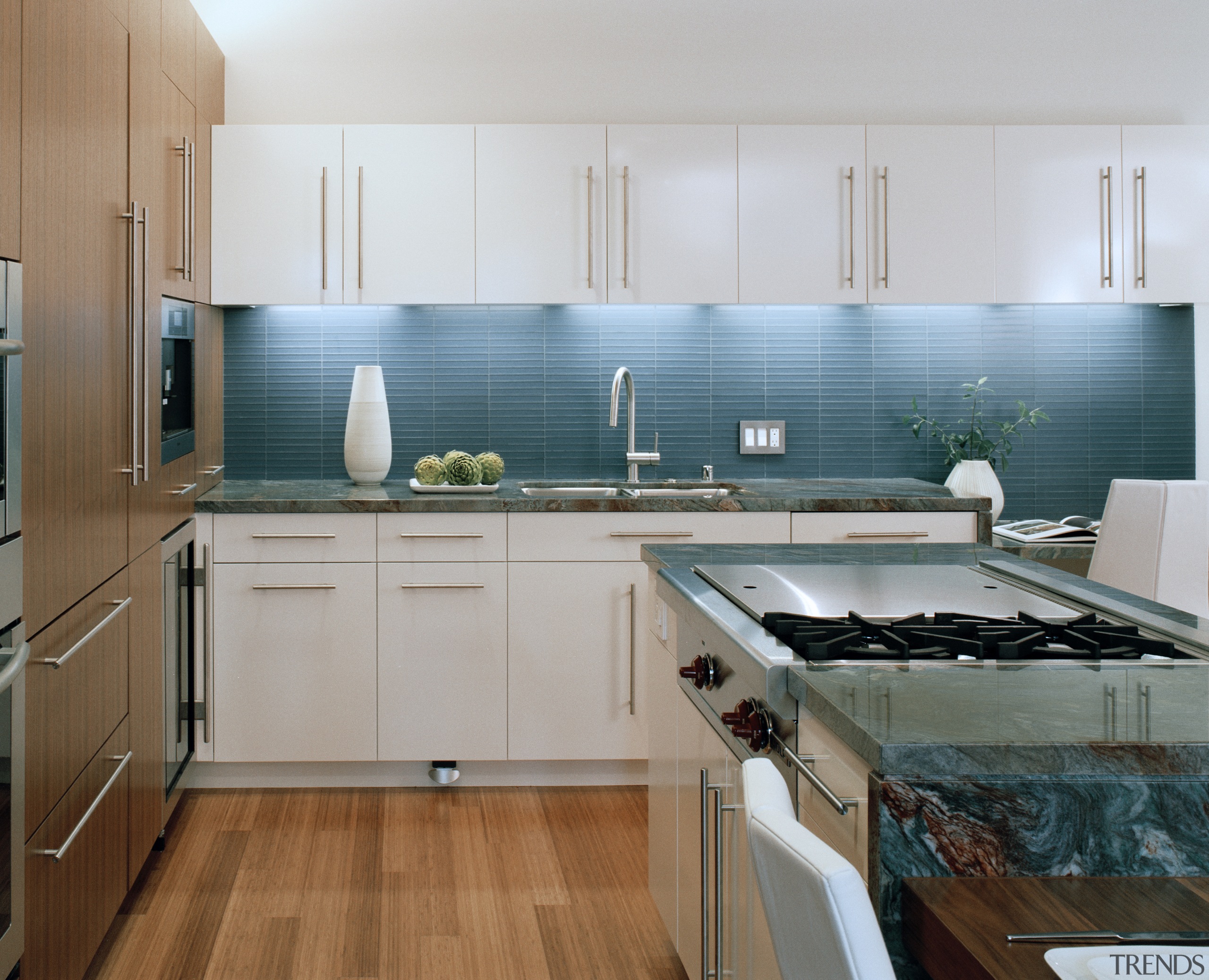 Blue Louise granite countertops are complemented by an cabinetry, countertop, cuisine classique, floor, flooring, hardwood, interior design, kitchen, real estate, room, gray