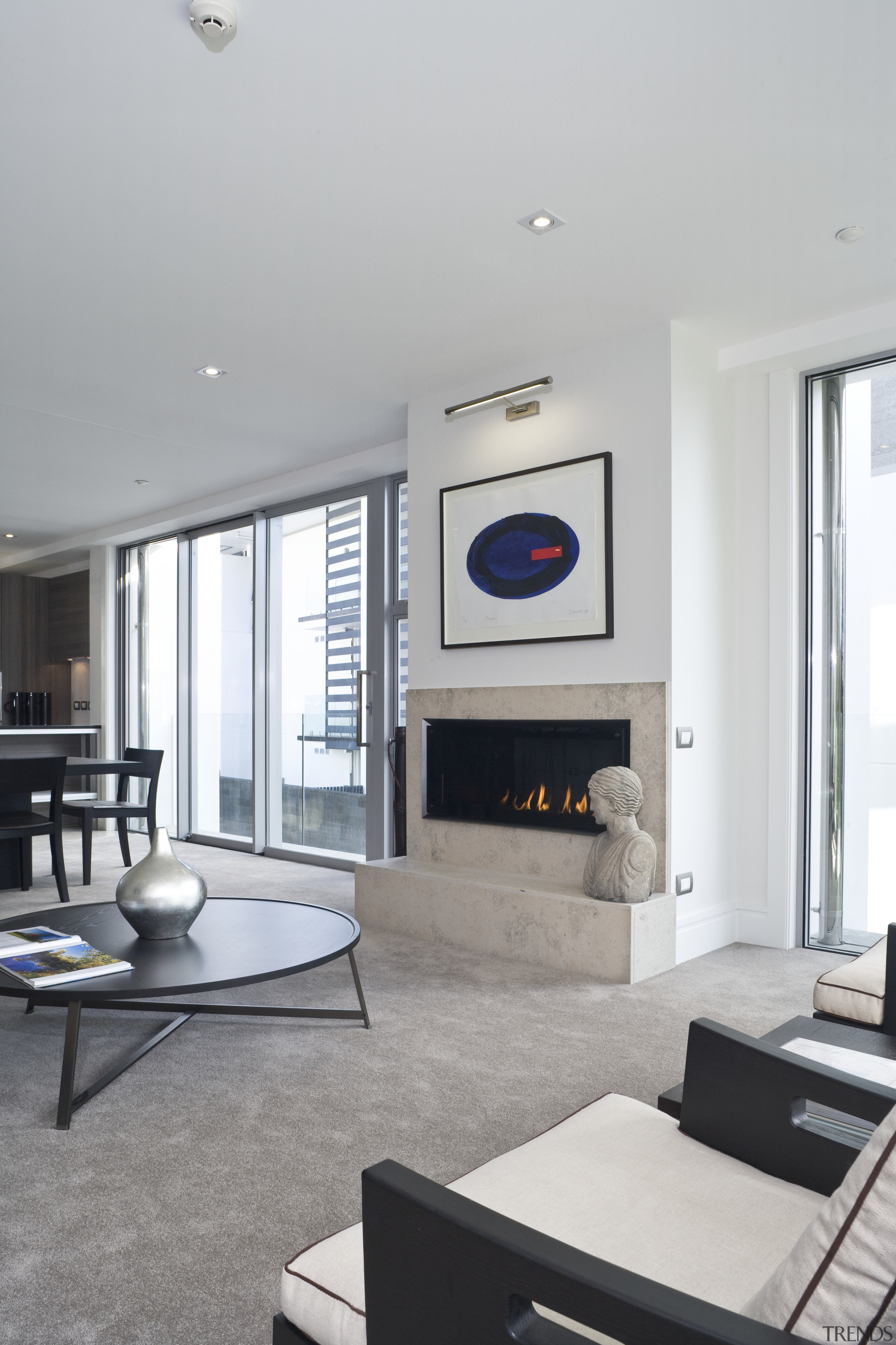 View of a gas fireplace in the White fireplace, floor, hearth, home, interior design, living room, room, gray