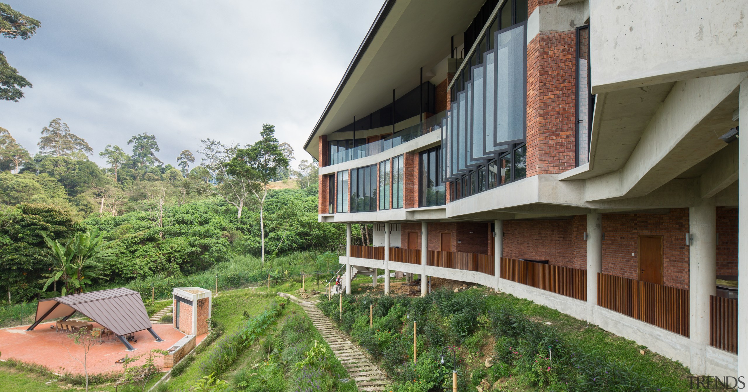 A BBQ terrace was created at the bottom apartment, architecture, building, cottage, estate, facade, home, house, land lot, property, real estate, residential area, roof, rural area, tree, window, gray, brown