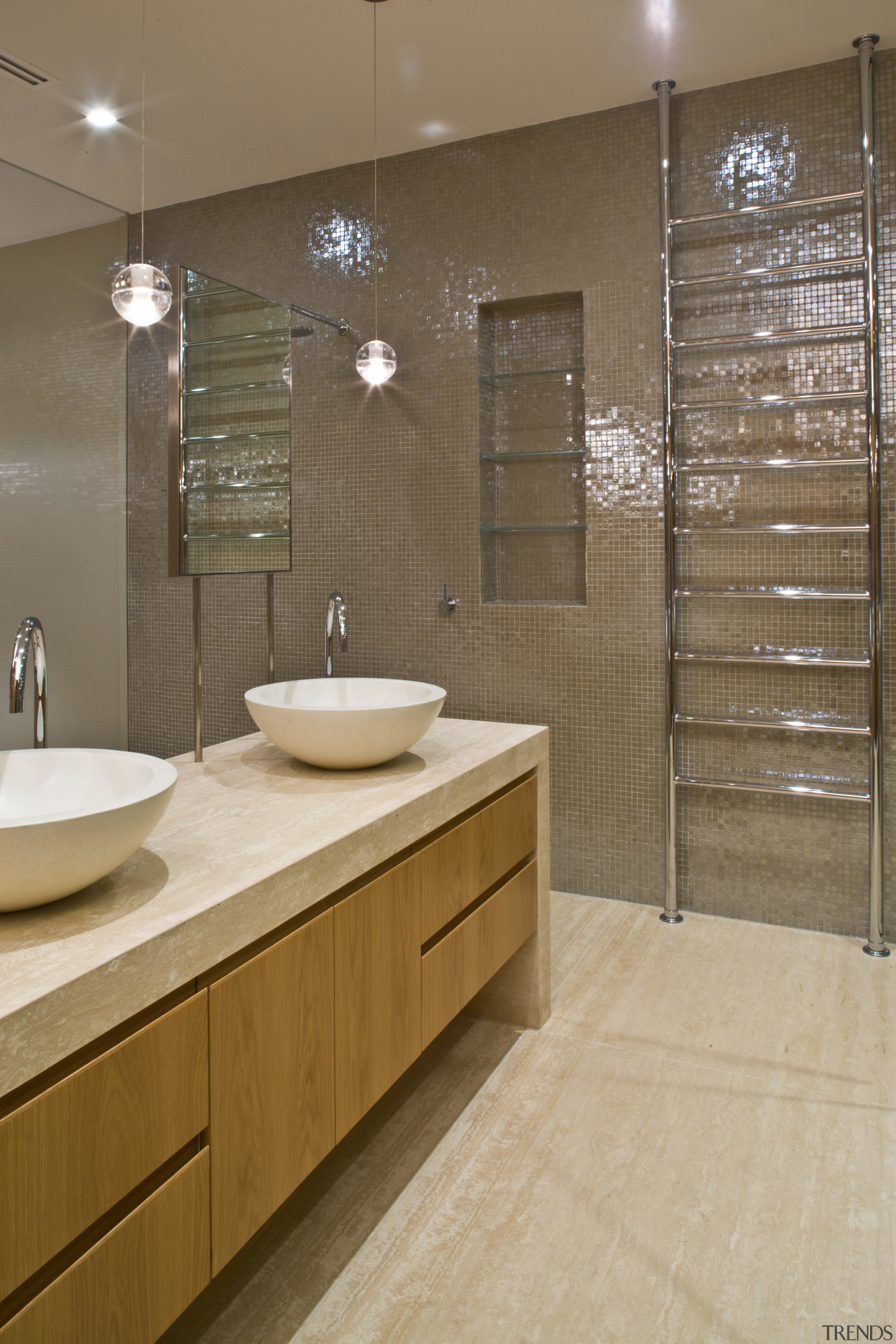 View of contemporary bathroom with mirror wall, white bathroom, cabinetry, countertop, floor, flooring, interior design, room, sink, tile, brown