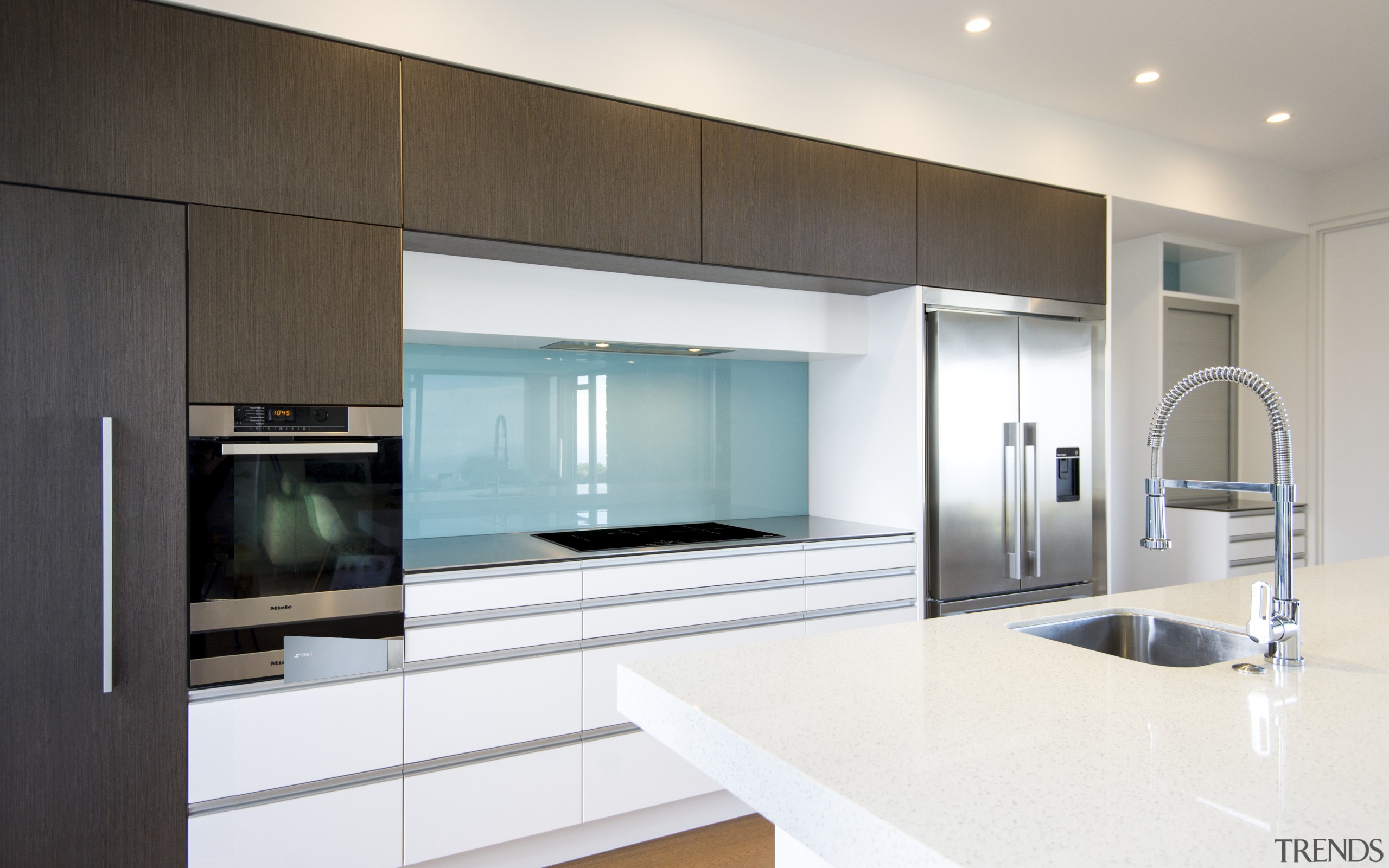 The white semi-gloss lacquered cabinets in this kitchen cabinetry, countertop, home appliance, interior design, kitchen, real estate, white