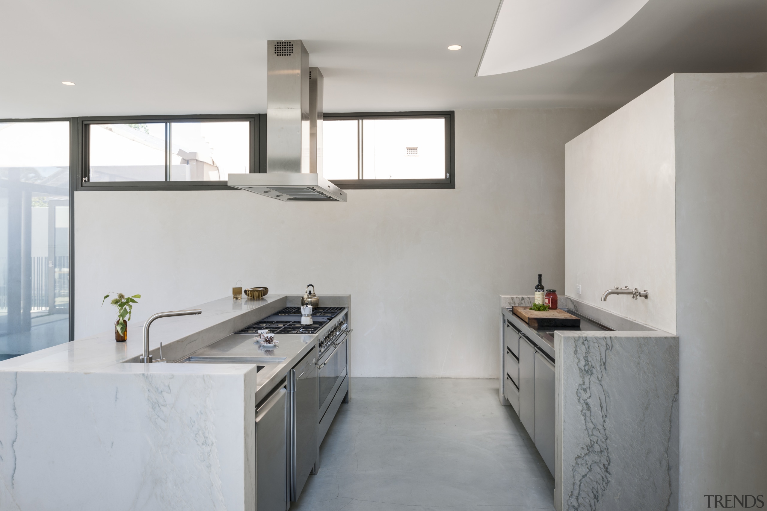 A curved skylight above this new kitchen echoes architecture, bathroom, countertop, floor, home, interior design, kitchen, real estate, room, sink, tap, gray