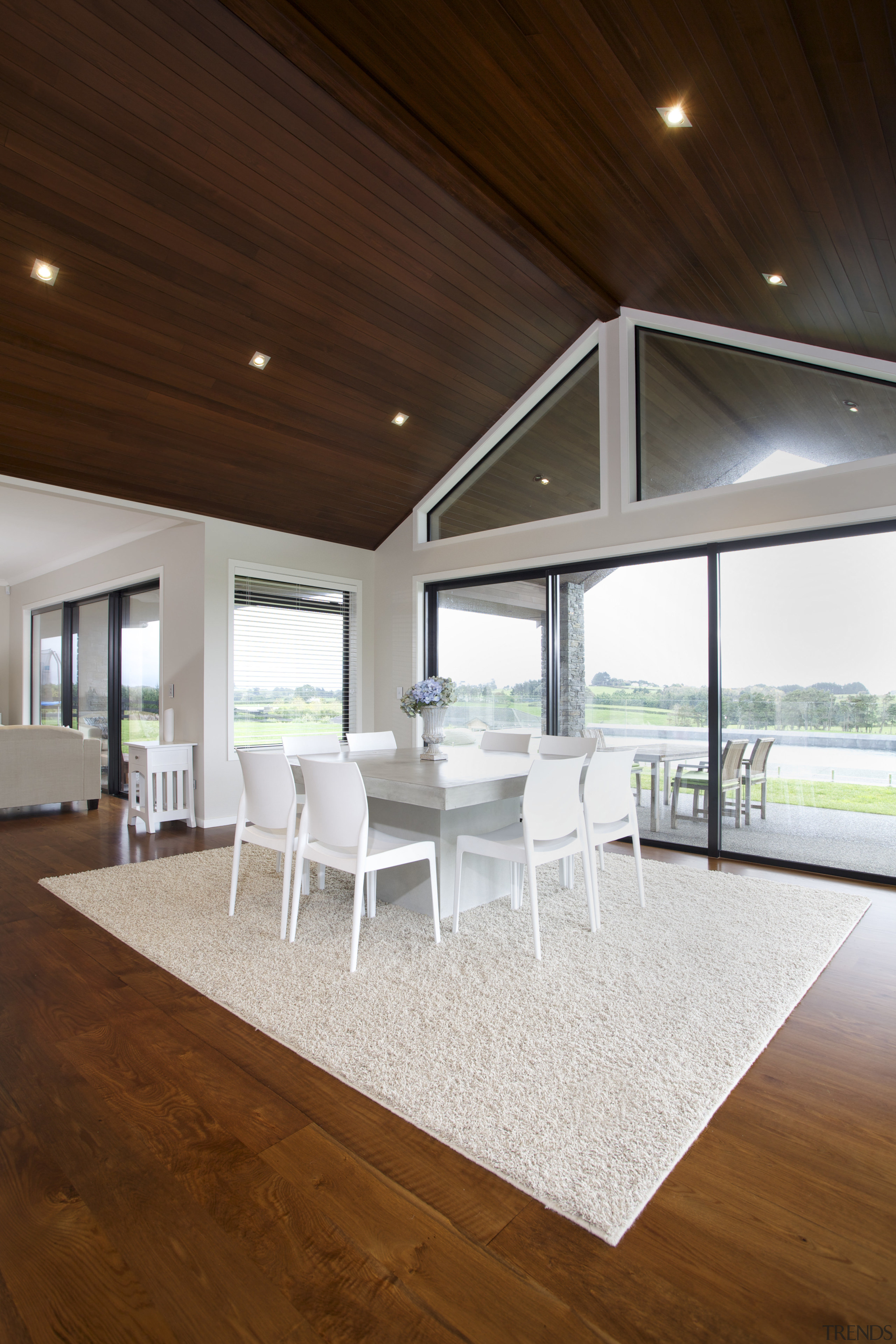 The house features a mix of solid oak architecture, ceiling, daylighting, floor, flooring, hardwood, home, house, interior design, living room, real estate, table, window, wood, wood flooring, brown, white