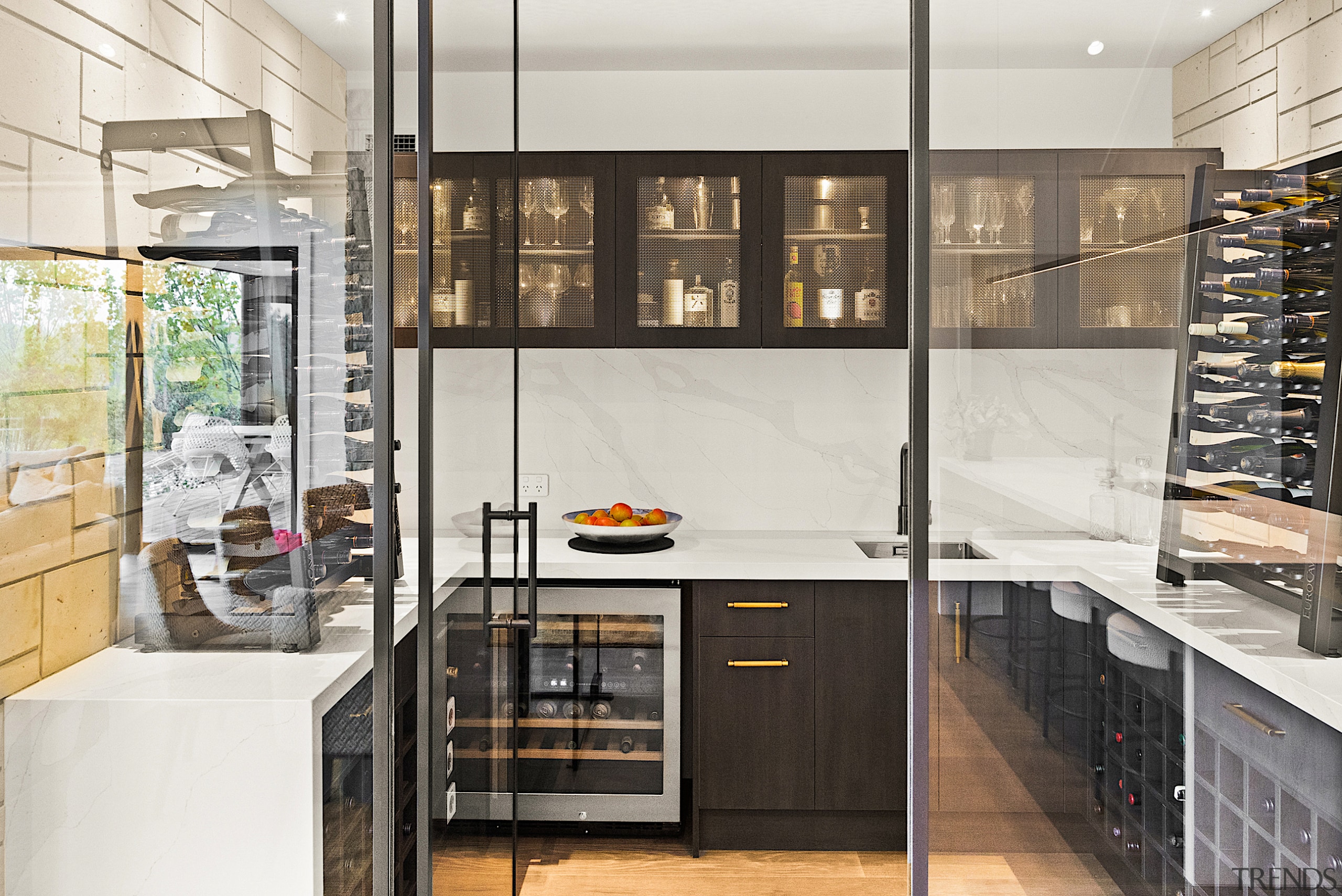 A focal point is the temperature-controlled wine room. 