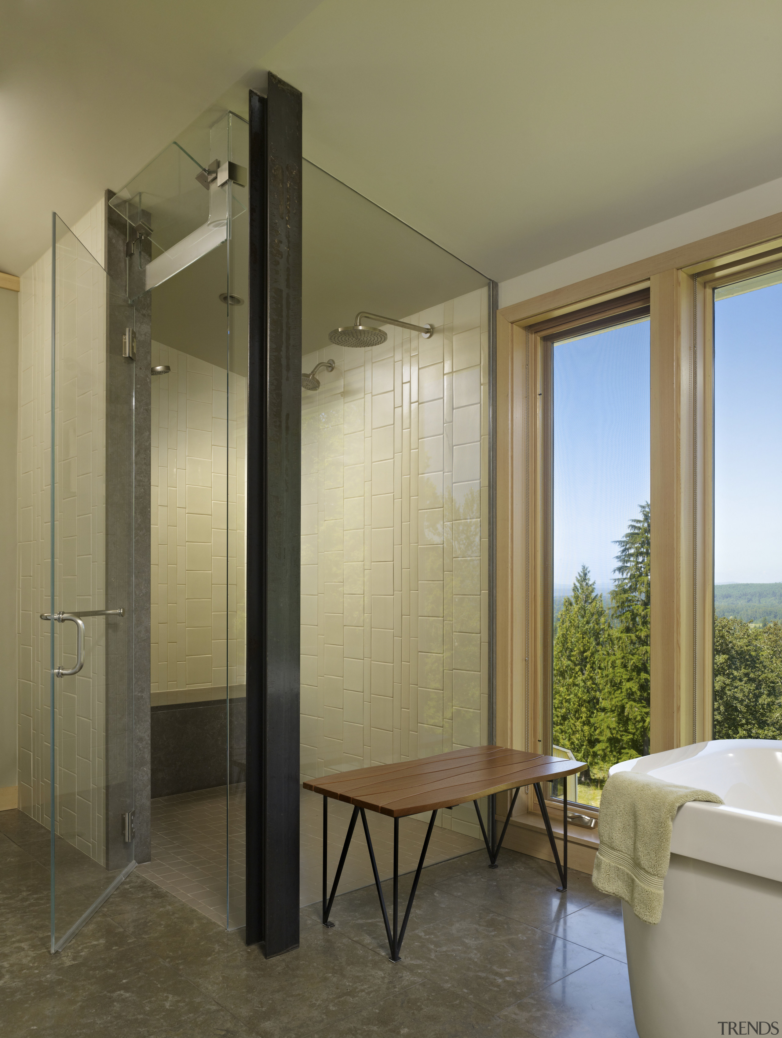 View of bathroom with grey flooring and small ceiling, interior design, window, brown