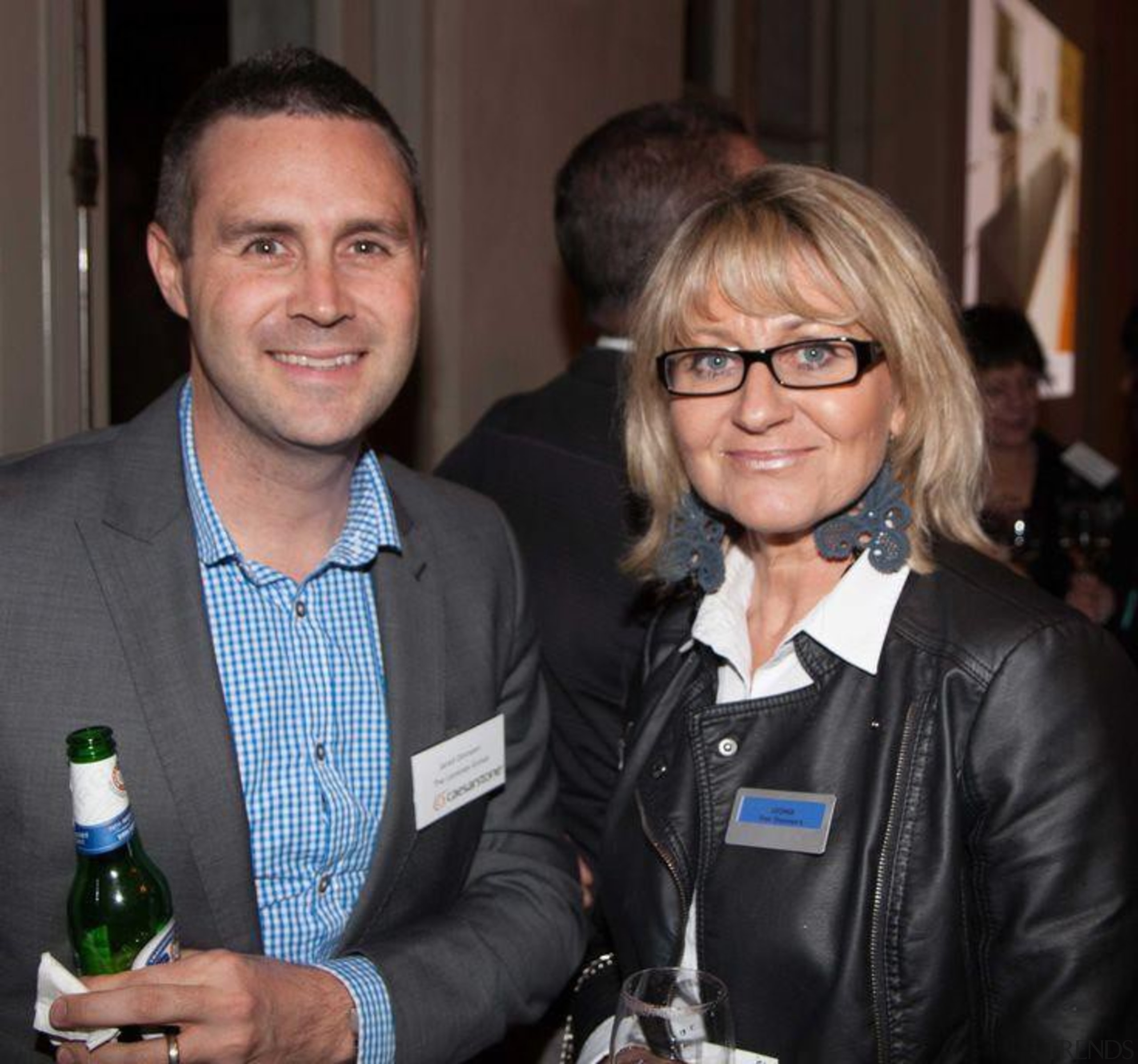 Jared Dinneen (Laminex New Zealand) and Leonie Von event, fashion, product, profession, professional, socialite, suit, black