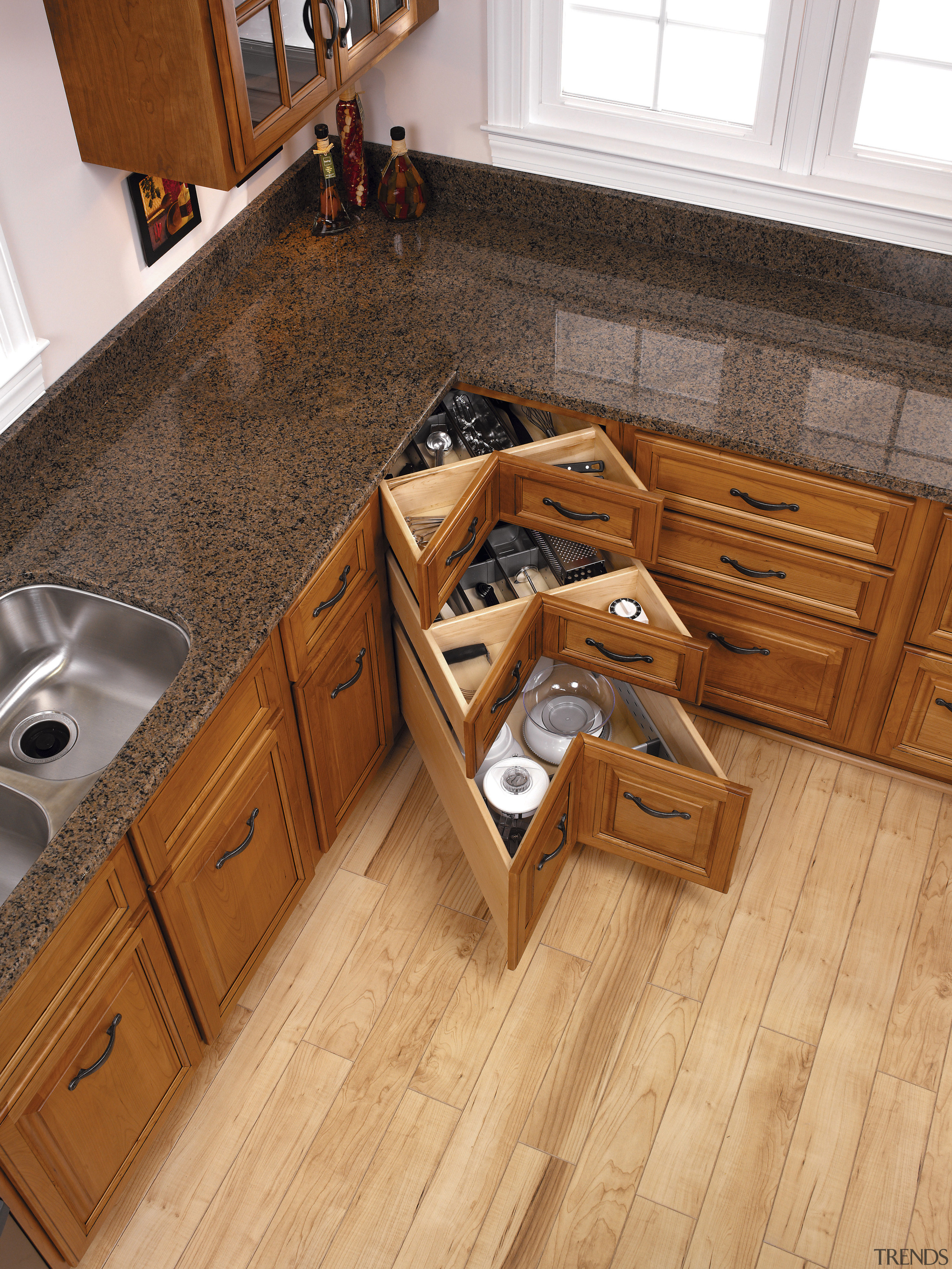 view of the blum's orga-lines drawers that offer cabinetry, countertop, drawer, floor, flooring, furniture, hardwood, kitchen, laminate flooring, room, tile, wood, wood flooring, wood stain, brown, orange