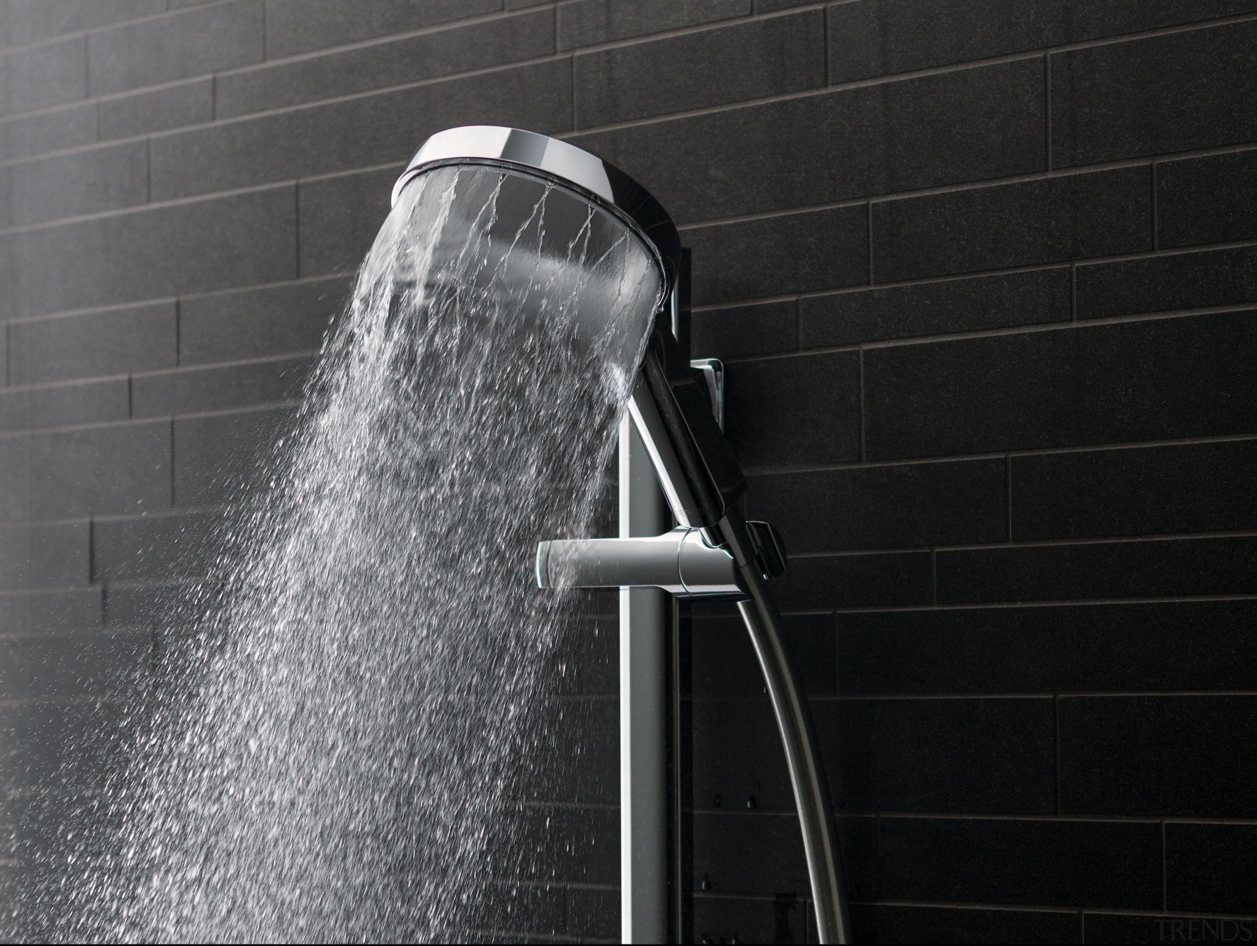 The new Aurajet showerhead offers improved spray coverage black, black and white, monochrome, monochrome photography, plumbing fixture, water, black, gray