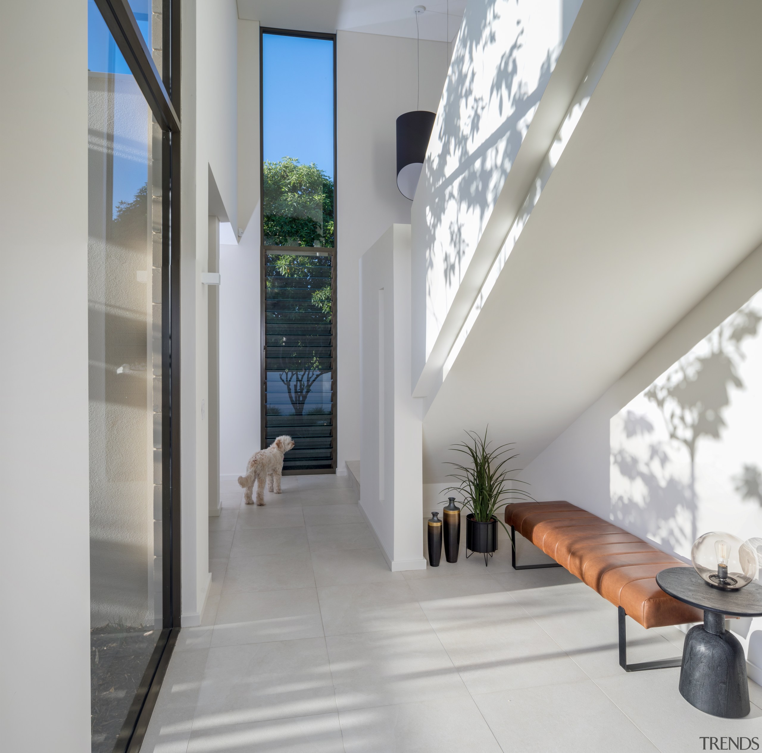 Contemporary, well-connected home opens up to backyard and aluminium, architecture, building, ceiling, daylighting, door, floor, flooring, furniture, glass, hall, home, house, interior design, loft, property, real estate, room, tile, white, window, gray