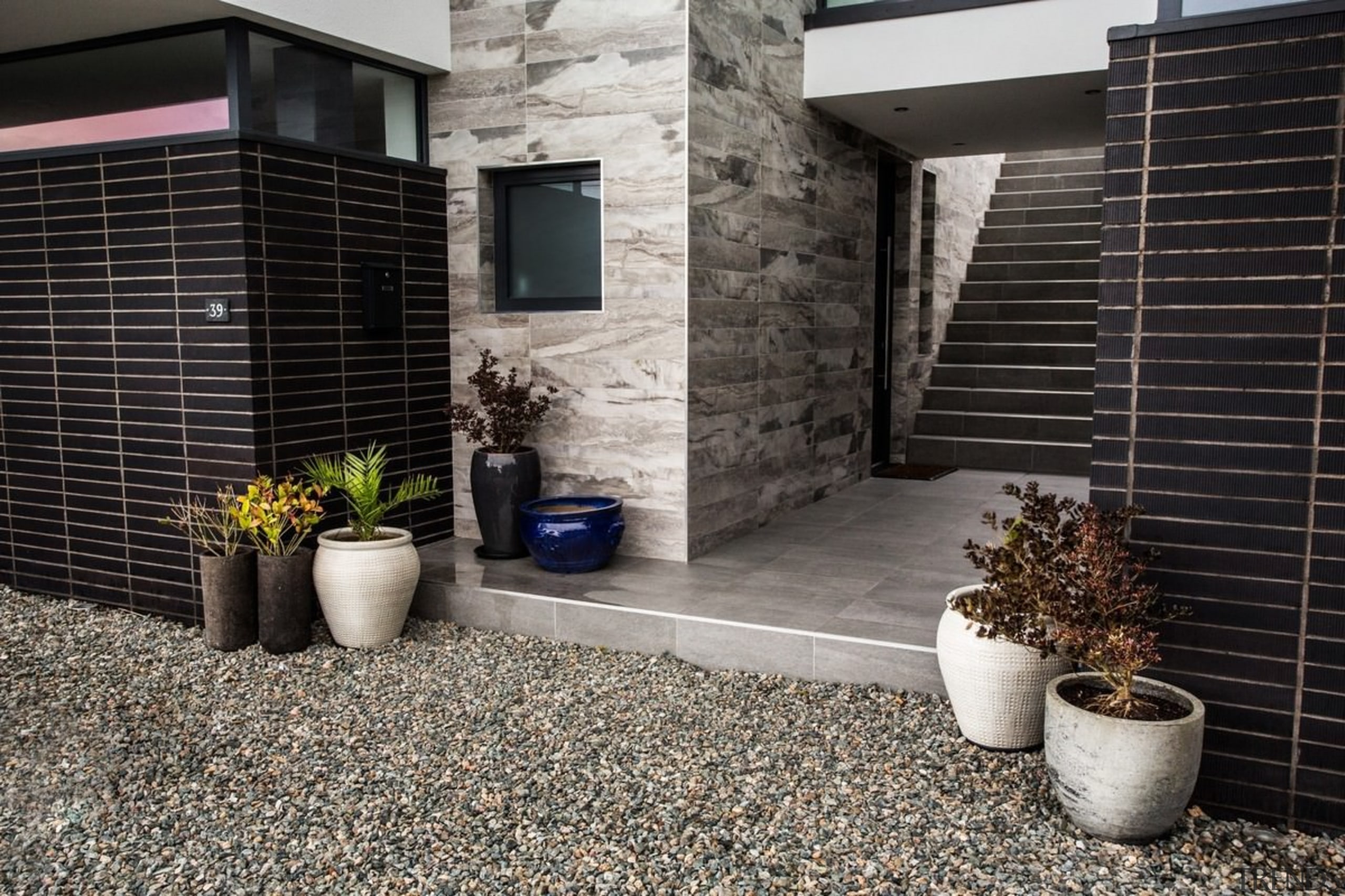 Architect: 2020 ArchitectsPhotography by Reinis Babrovskis courtyard, facade, floor, flooring, home, house, property, real estate, siding, walkway, wall, window, black, gray