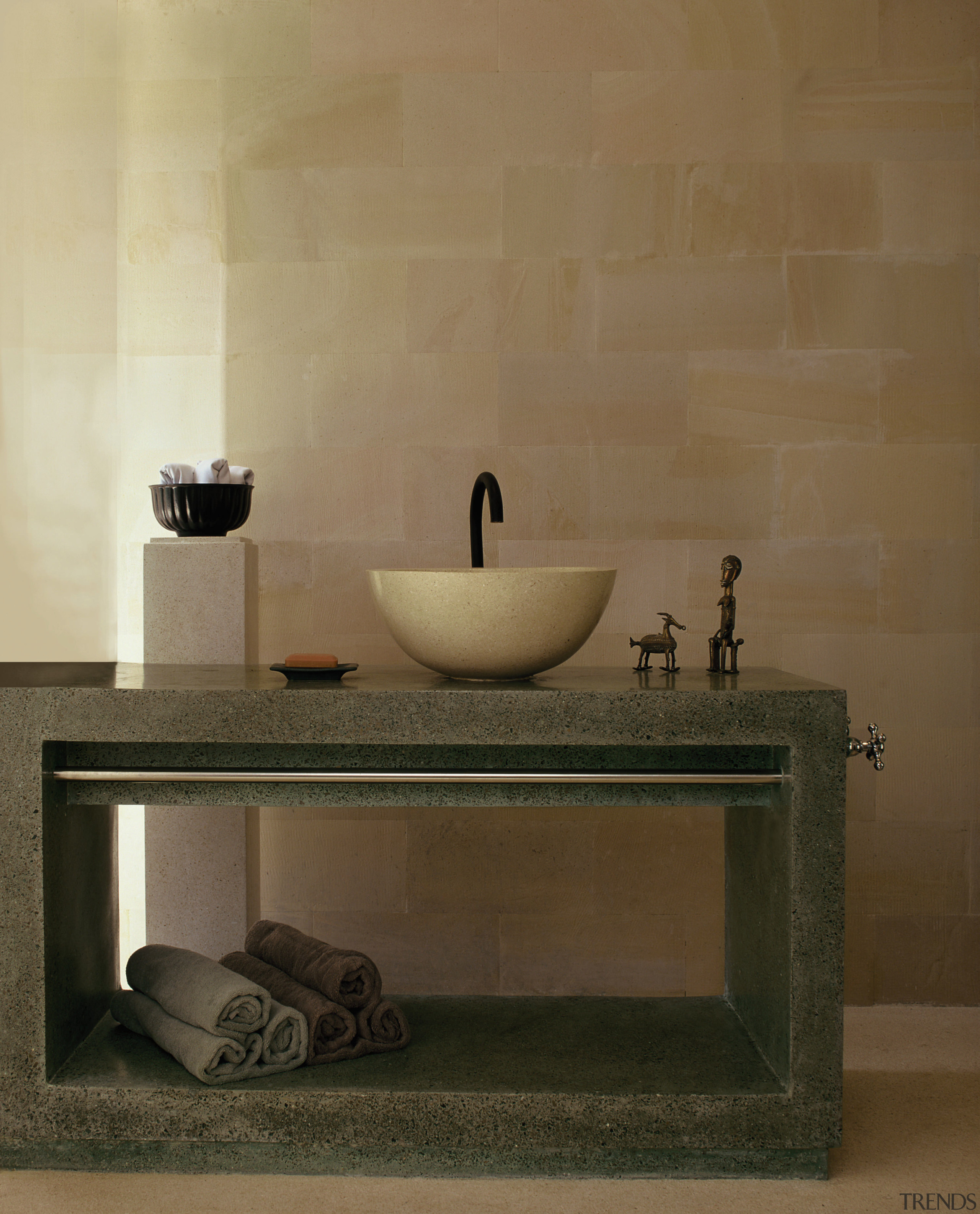 A view of the stone vanity, basin, tiled bathroom, bathroom sink, ceramic, floor, flooring, furniture, interior design, plumbing fixture, product design, sink, table, tap, tile, wall, brown