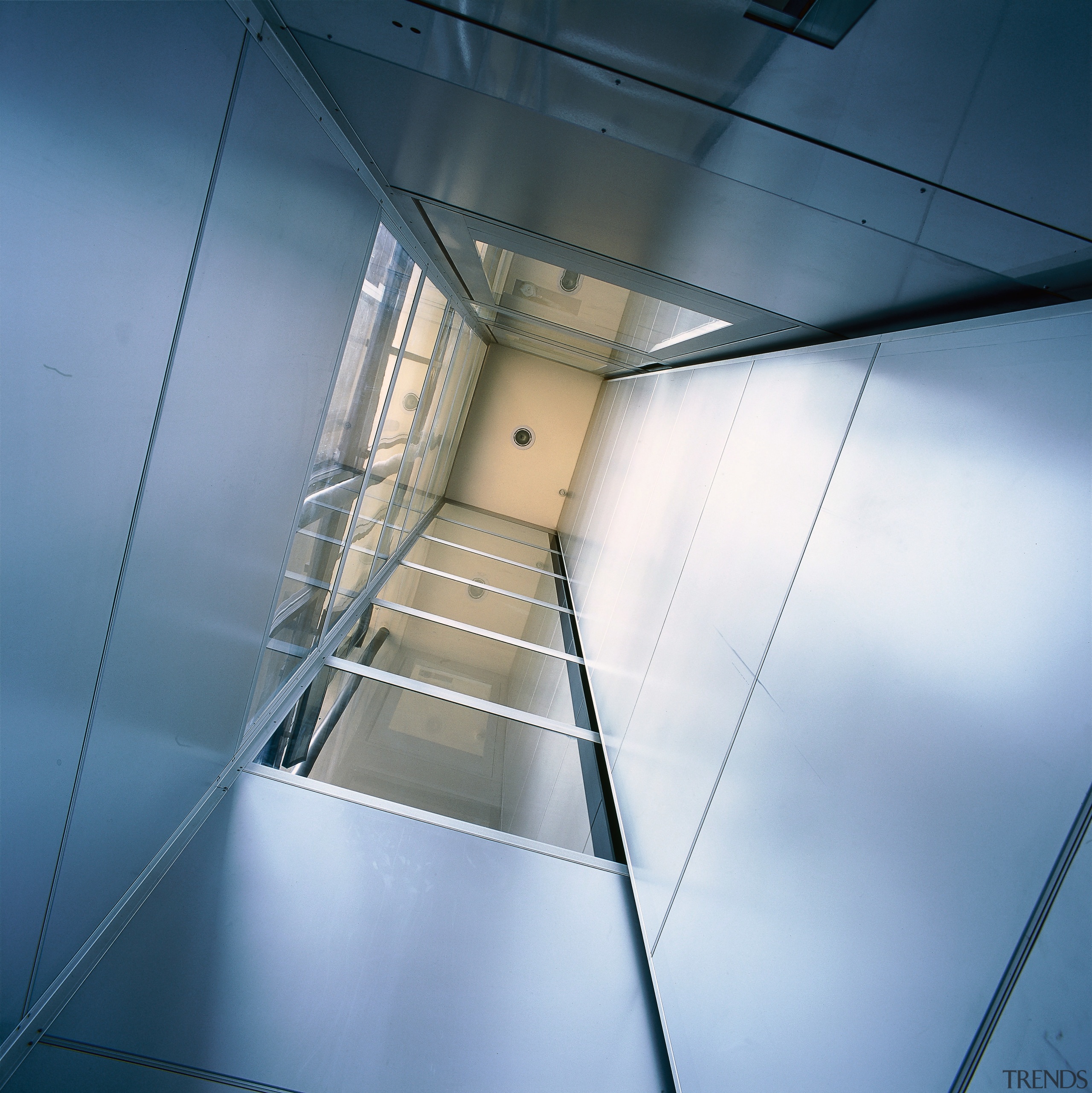 View of inside of lift shaft, looking up architecture, daylighting, daytime, glass, line, sky, structure, symmetry, teal