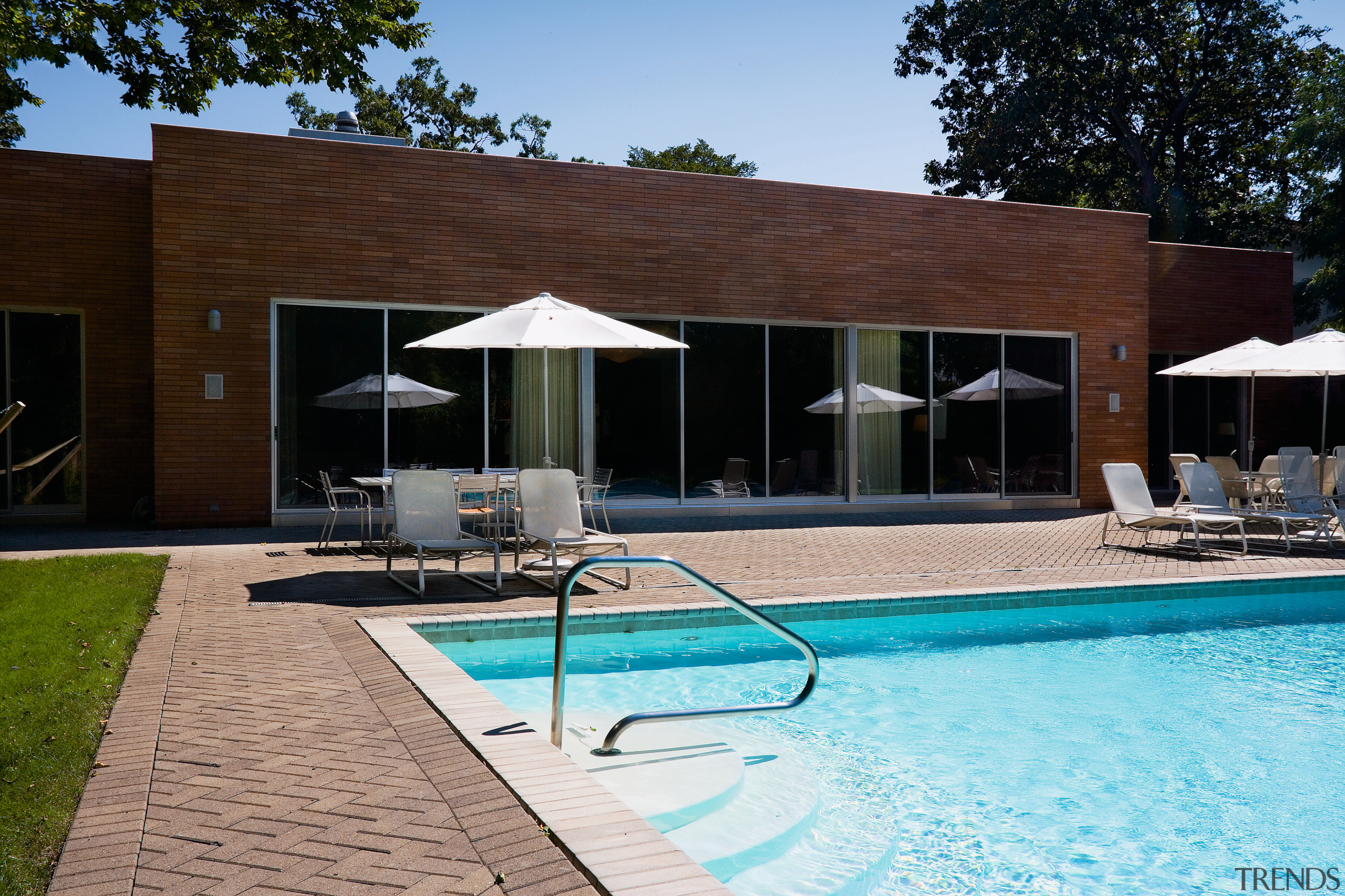 An exterior view of the pool and patio architecture, backyard, home, house, leisure, property, real estate, shade, swimming pool, black