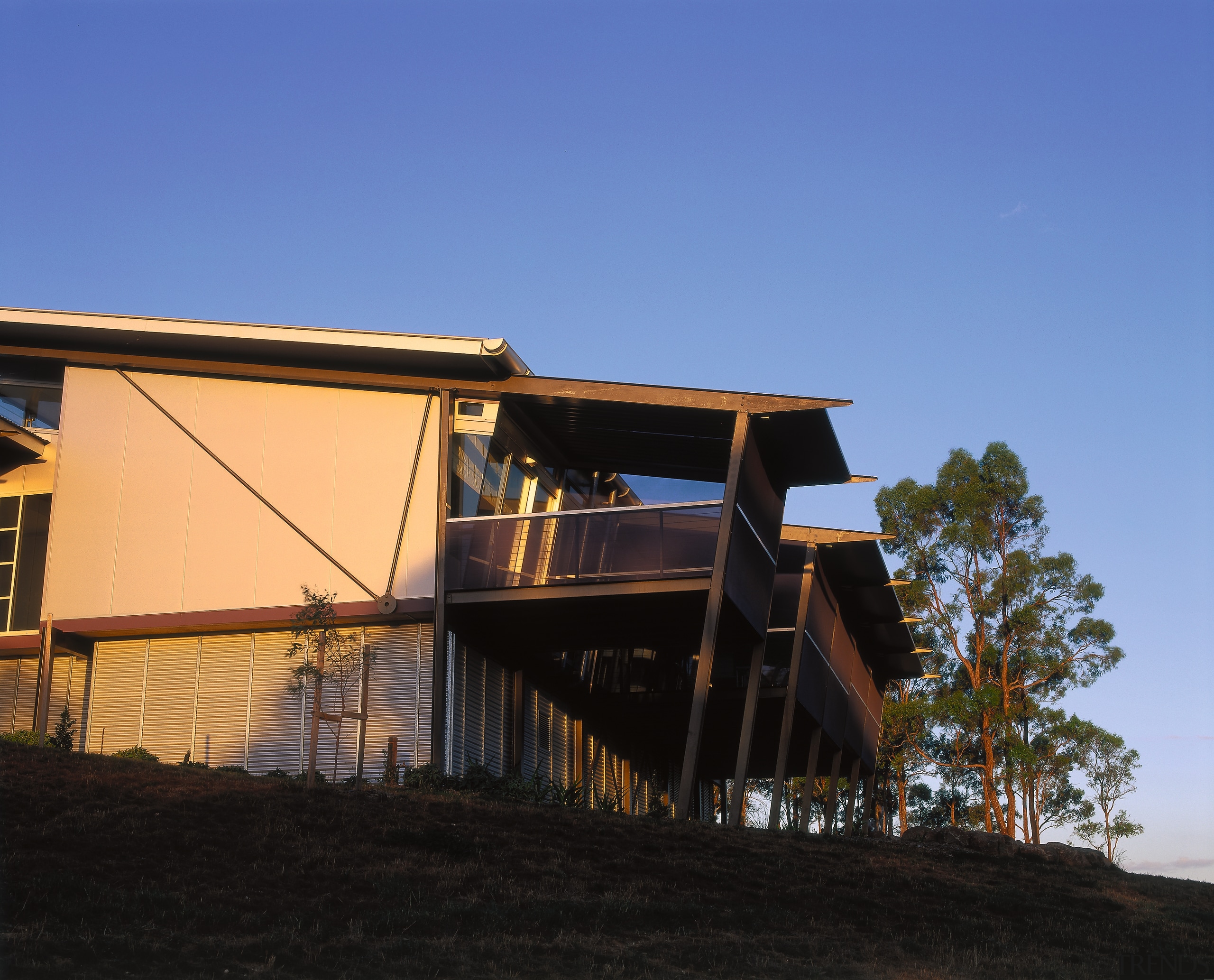 Side view of the house. Includes steel panels architecture, building, cottage, facade, home, house, real estate, roof, siding, sky, blue, black