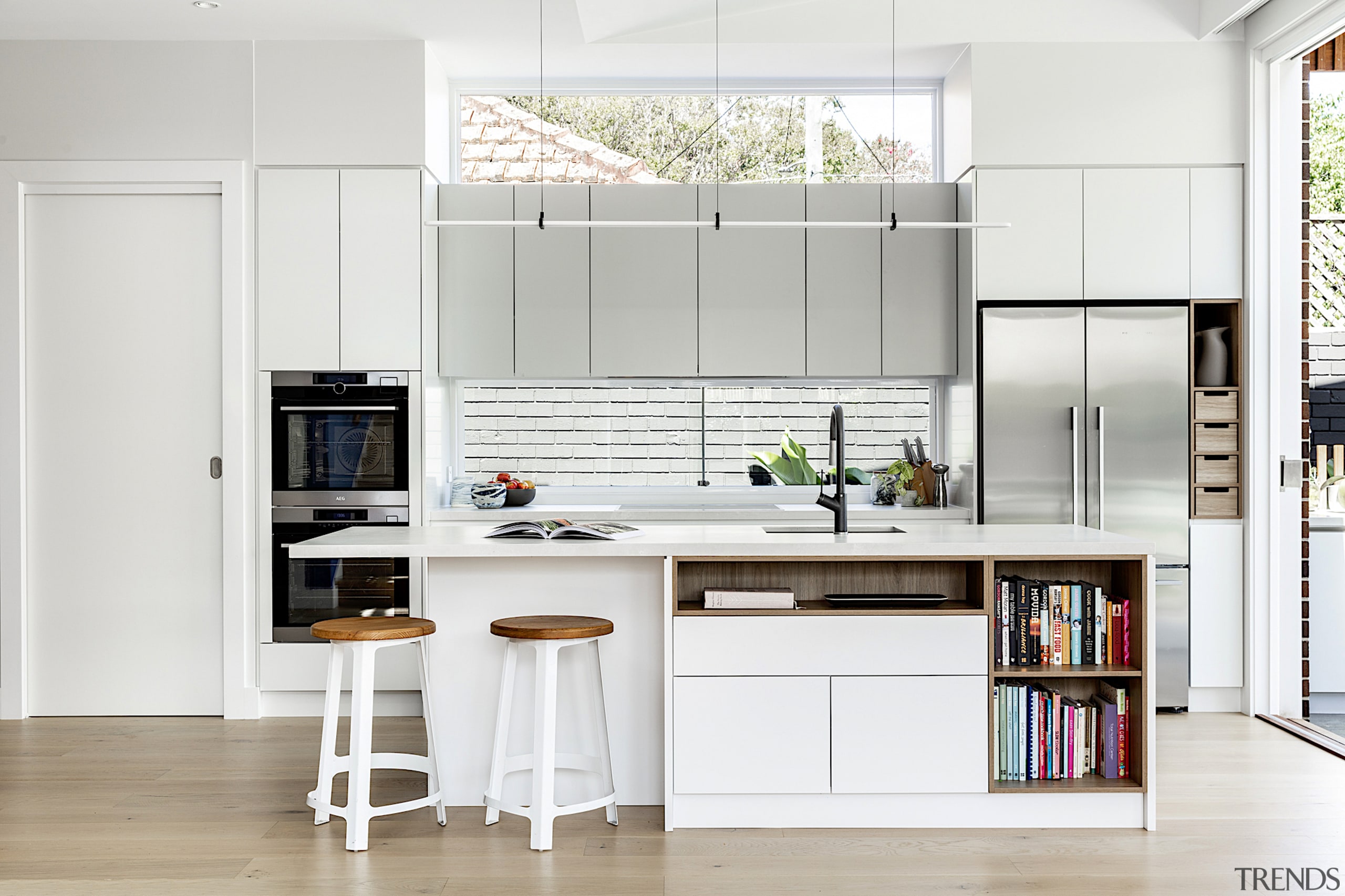 Clerestory windows help to flood the kitchen with 