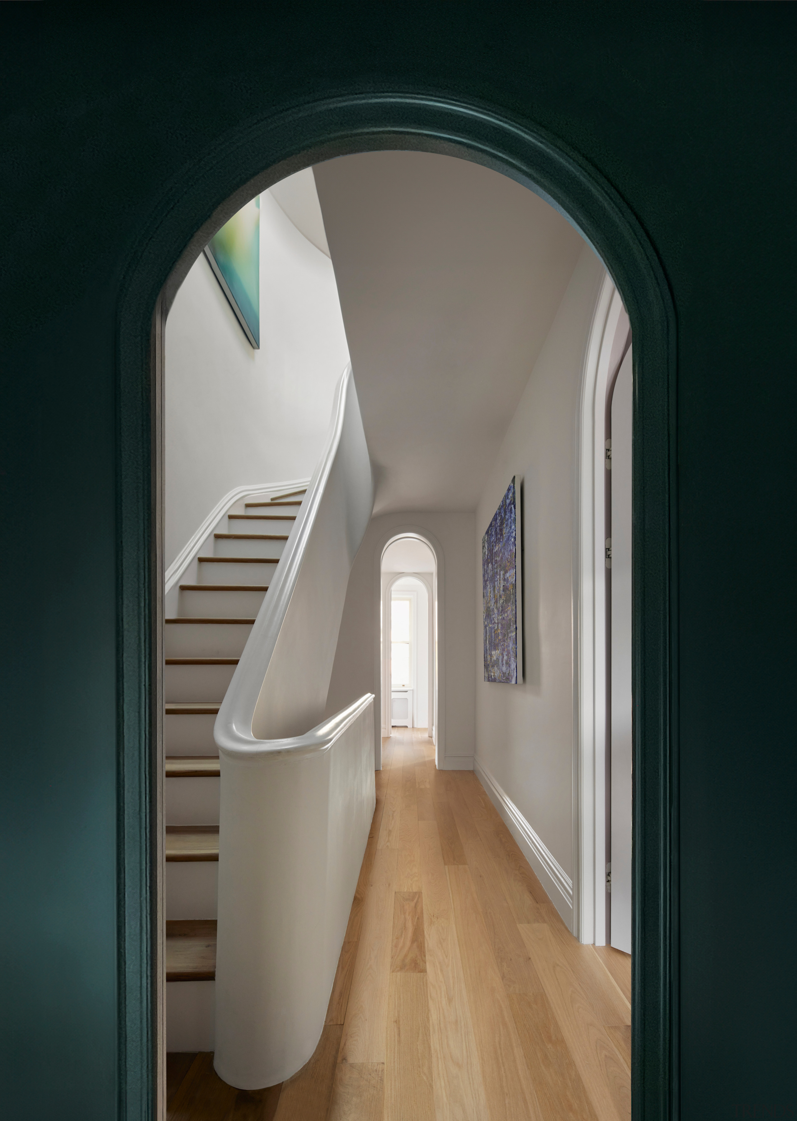 Circulation and sculptural stair. - Deep, moody and 