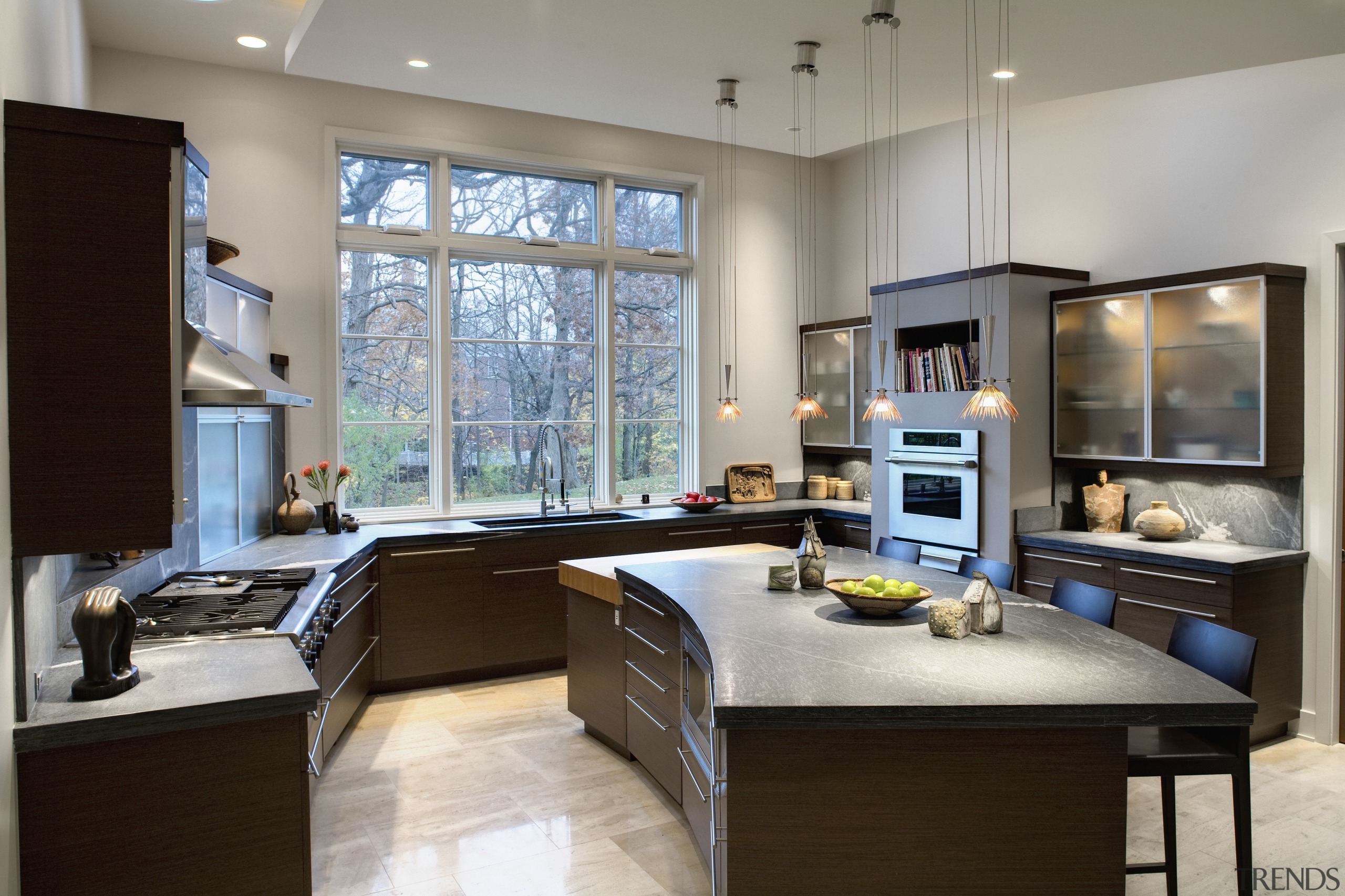 View of kitchen featuring kitchen island with 4 countertop, interior design, kitchen, living room, gray, black