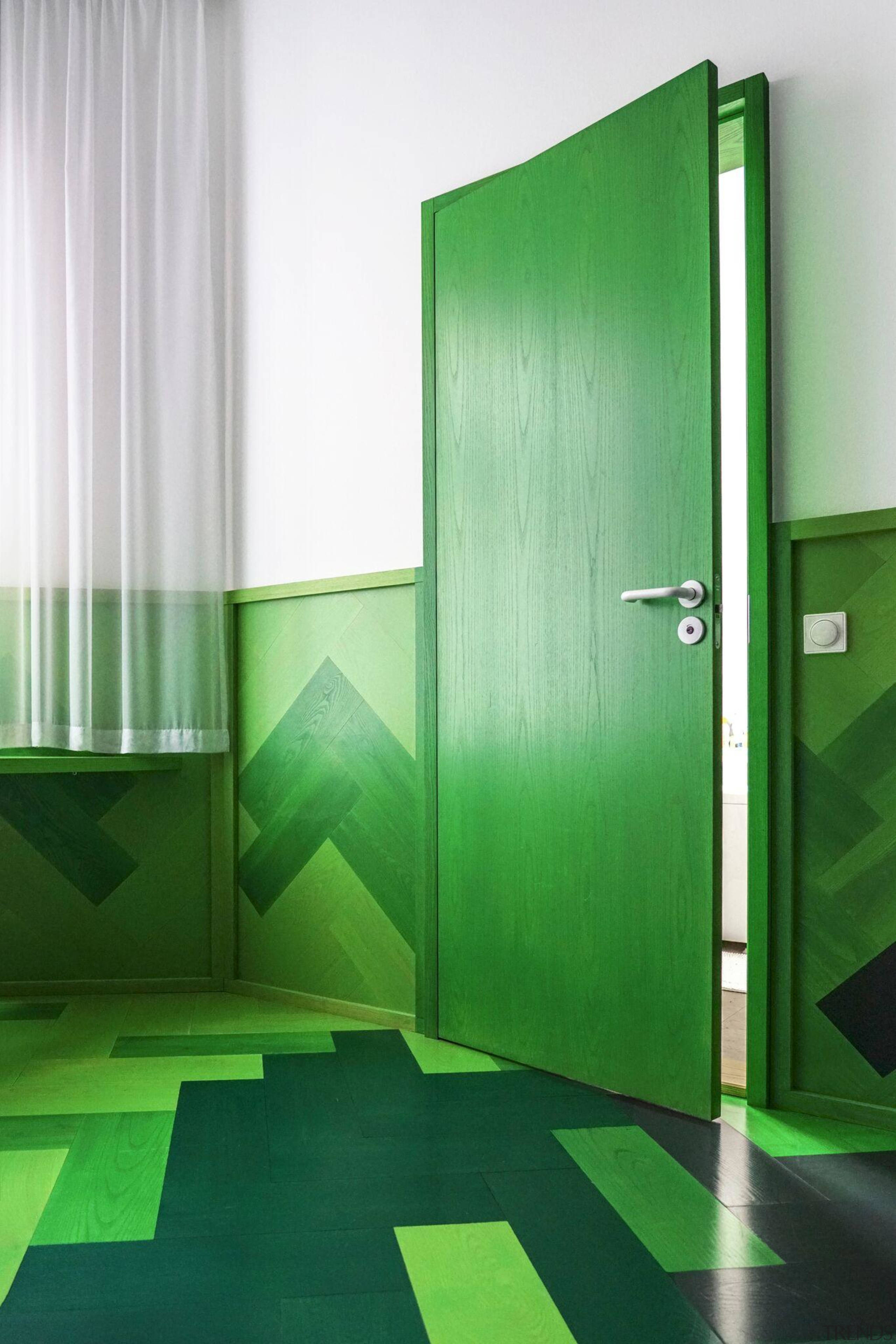 As part of the design, the architects took architecture, door, floor, glass, green, interior design, line, material property, plumbing fixture, restroom, room, toilet, vehicle door, wall, green, white