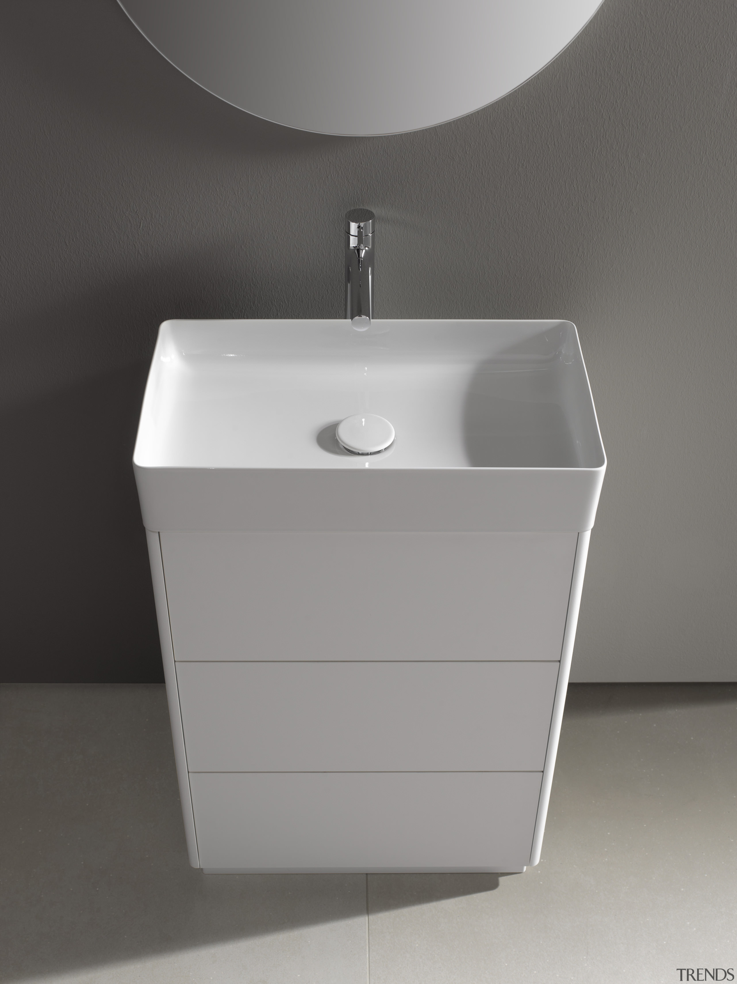 Contemporary minimalist vanity with handless drawers and space-saving angle, bathroom, bathroom accessory, bathroom cabinet, bathroom sink, ceramic, drawer, plumbing fixture, product, product design, sink, structure, tap, toilet seat, gray