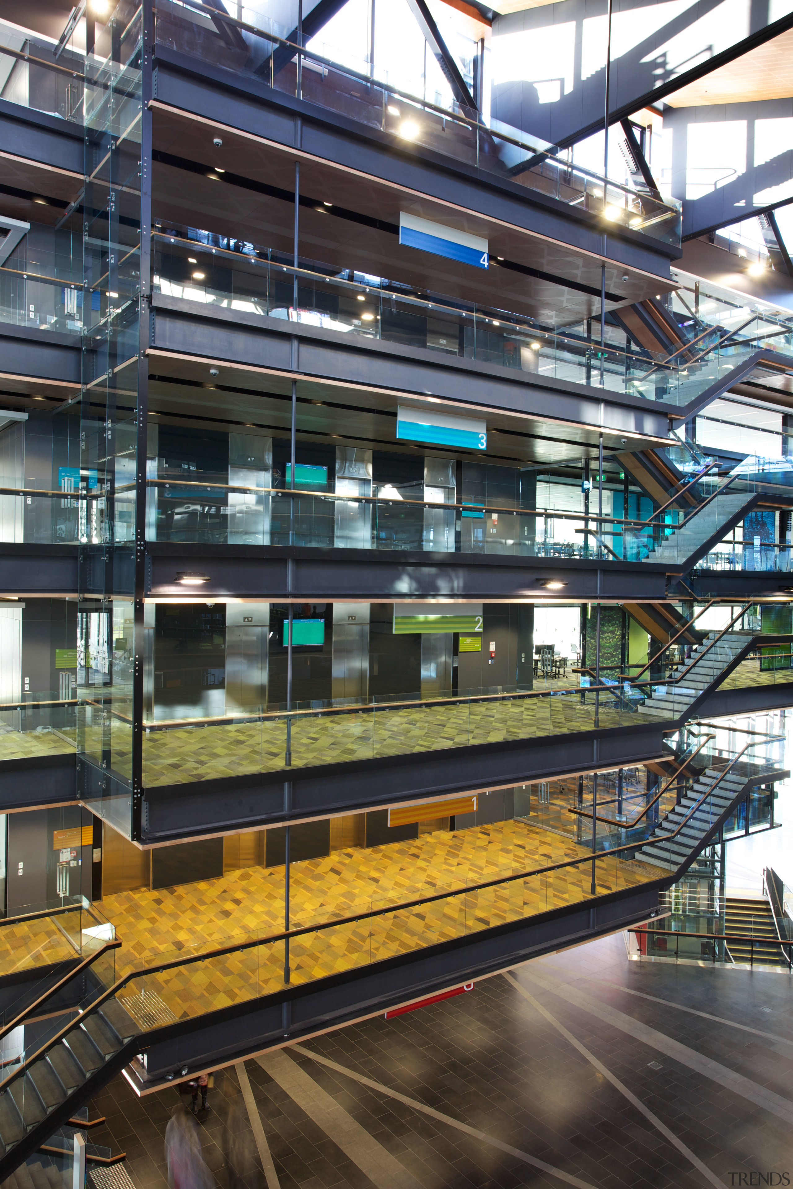 Lifts and escalators at tertiary campus and transport architecture, building, glass, metropolis, metropolitan area, mixed use, black