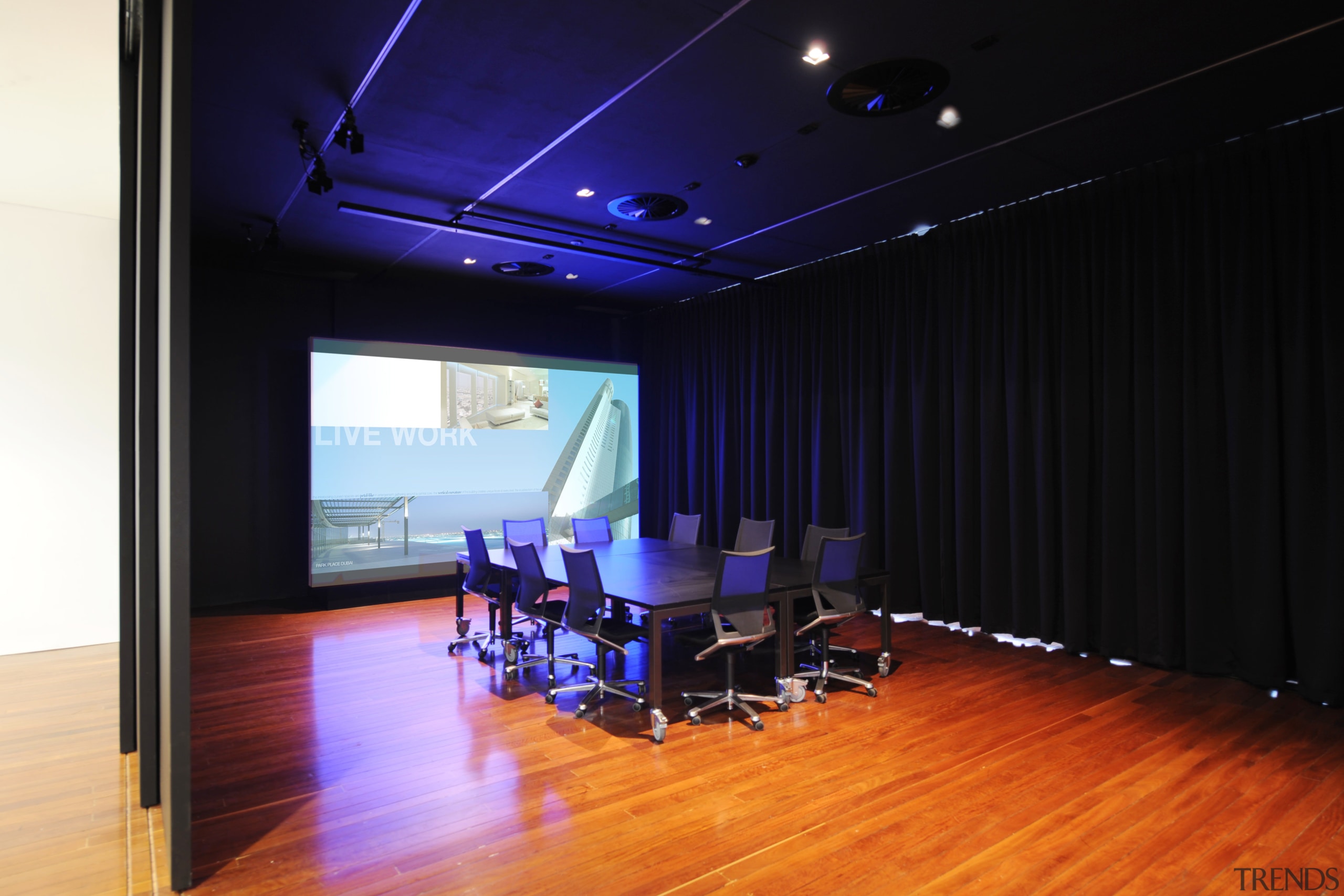 Architectural firm Coz Howlett &amp; Bailey Woodland relocated auditorium, ceiling, floor, flooring, interior design, room, studio, black, blue