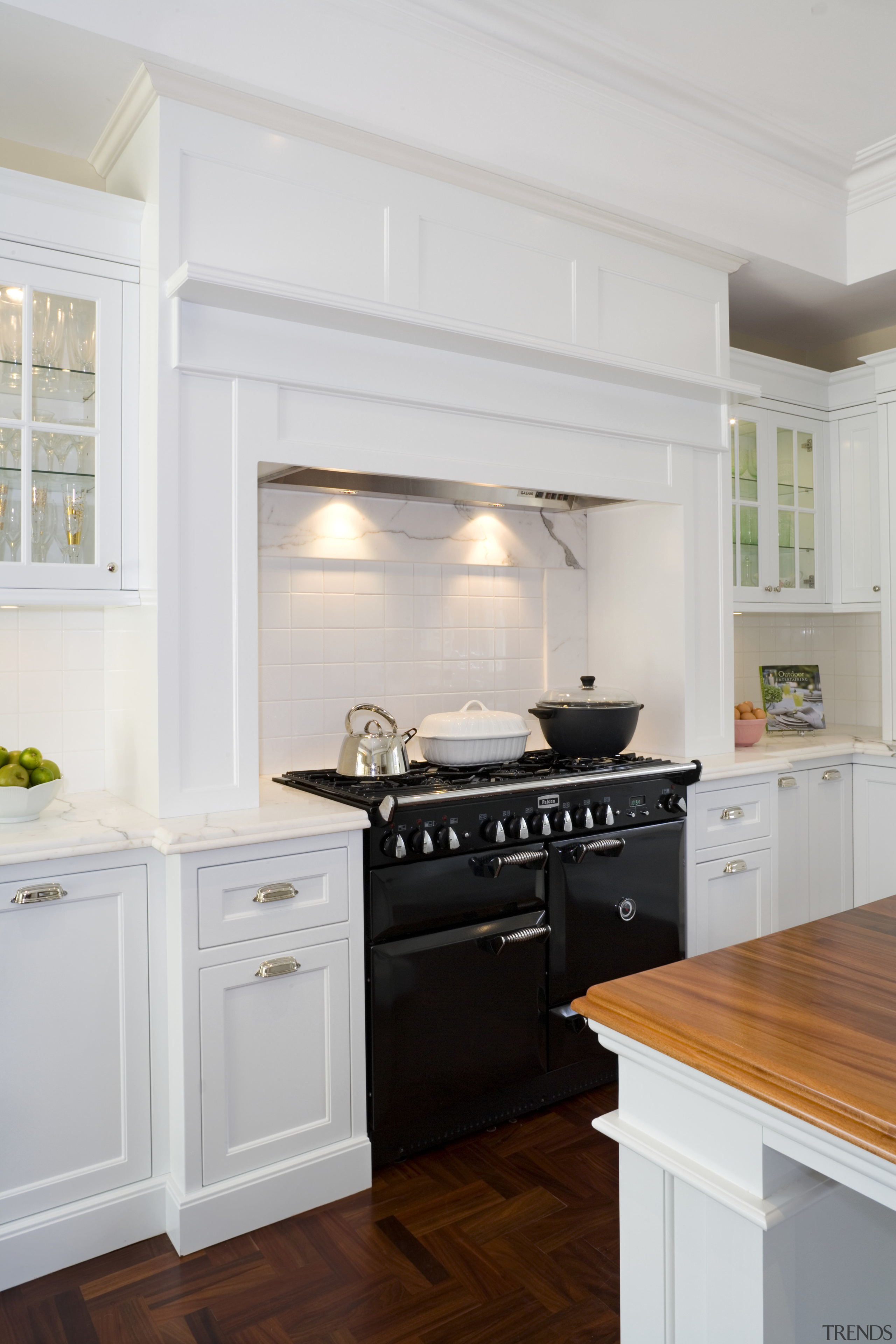 View of kitchen designed by architect Gary McFarlane cabinetry, countertop, cuisine classique, floor, flooring, home, home appliance, interior design, kitchen, kitchen appliance, kitchen stove, room, window, wood flooring, gray, white