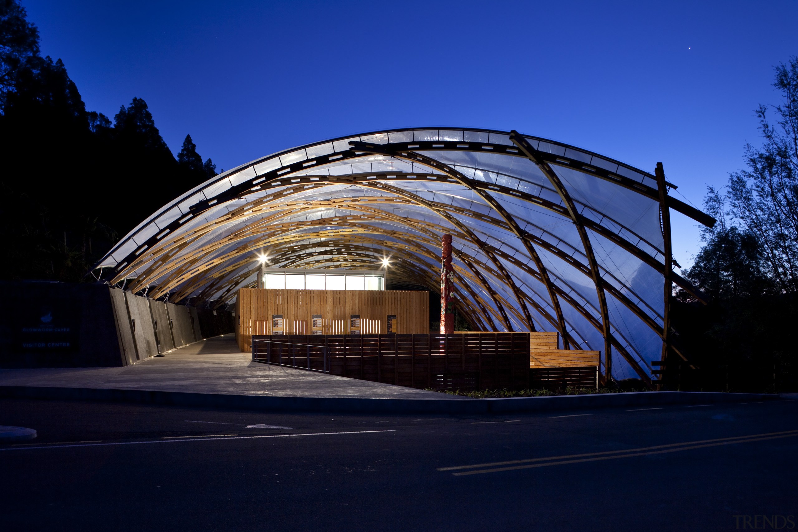 View of the canopy at the Waitomo Caves arch, architecture, building, corporate headquarters, daylighting, evening, facade, fixed link, landmark, metropolitan area, night, residential area, sky, structure, black, blue